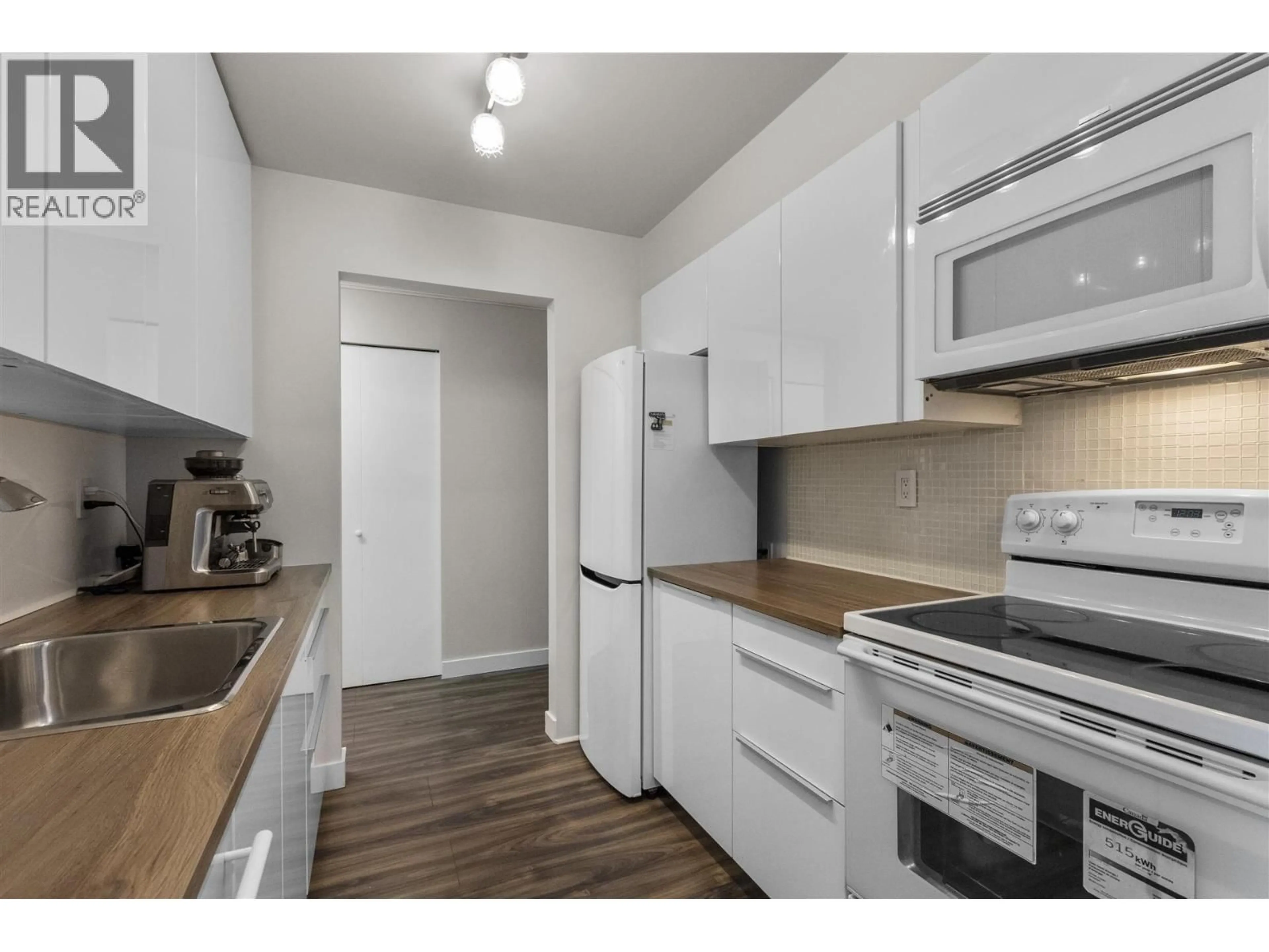 Standard kitchen, wood/laminate floor for 302 - 2328 OXFORD STREET, Vancouver British Columbia V5L1G3