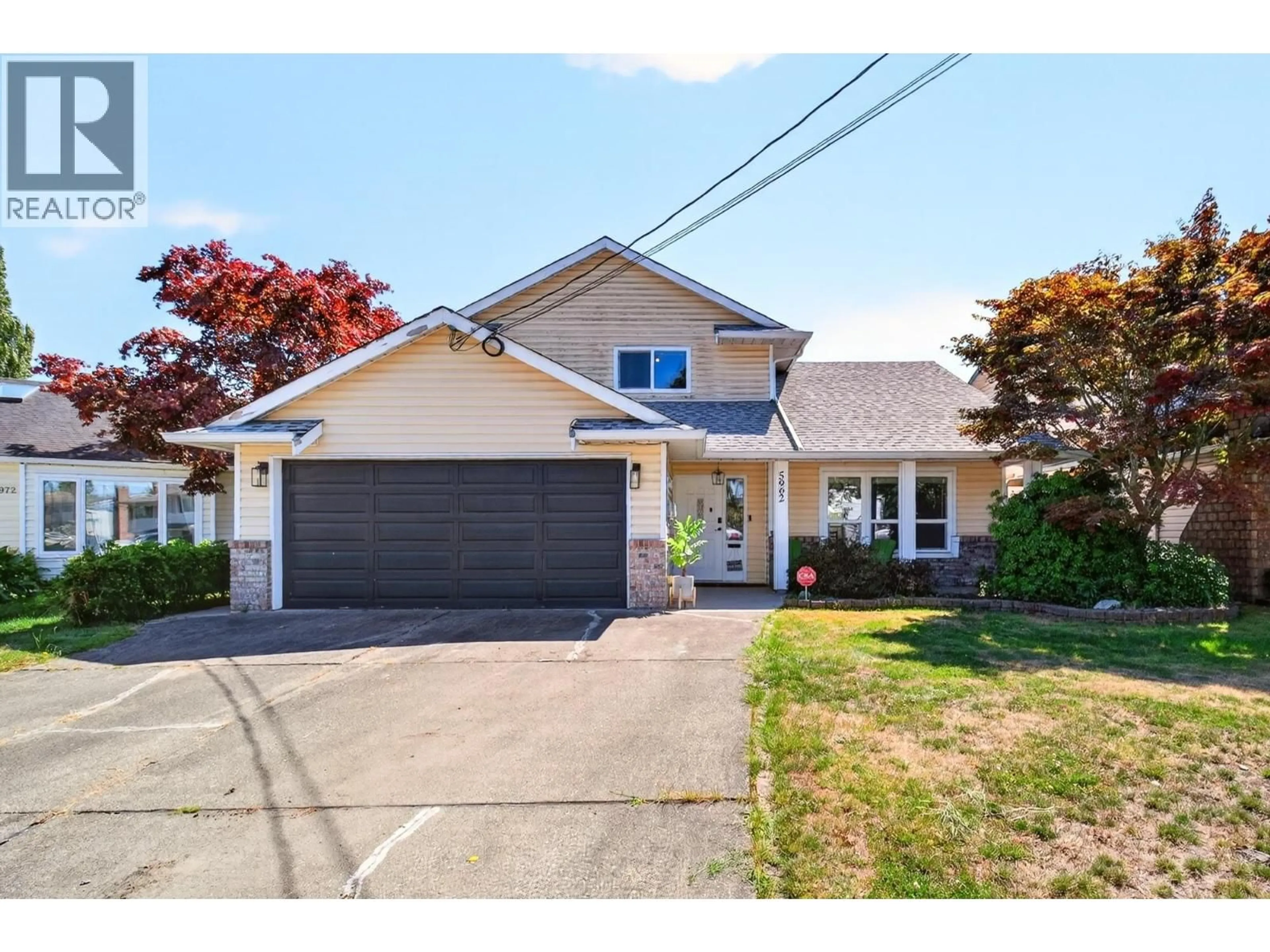 Home with vinyl exterior material, street for 5962 49A AVENUE, Delta British Columbia V4K4L9
