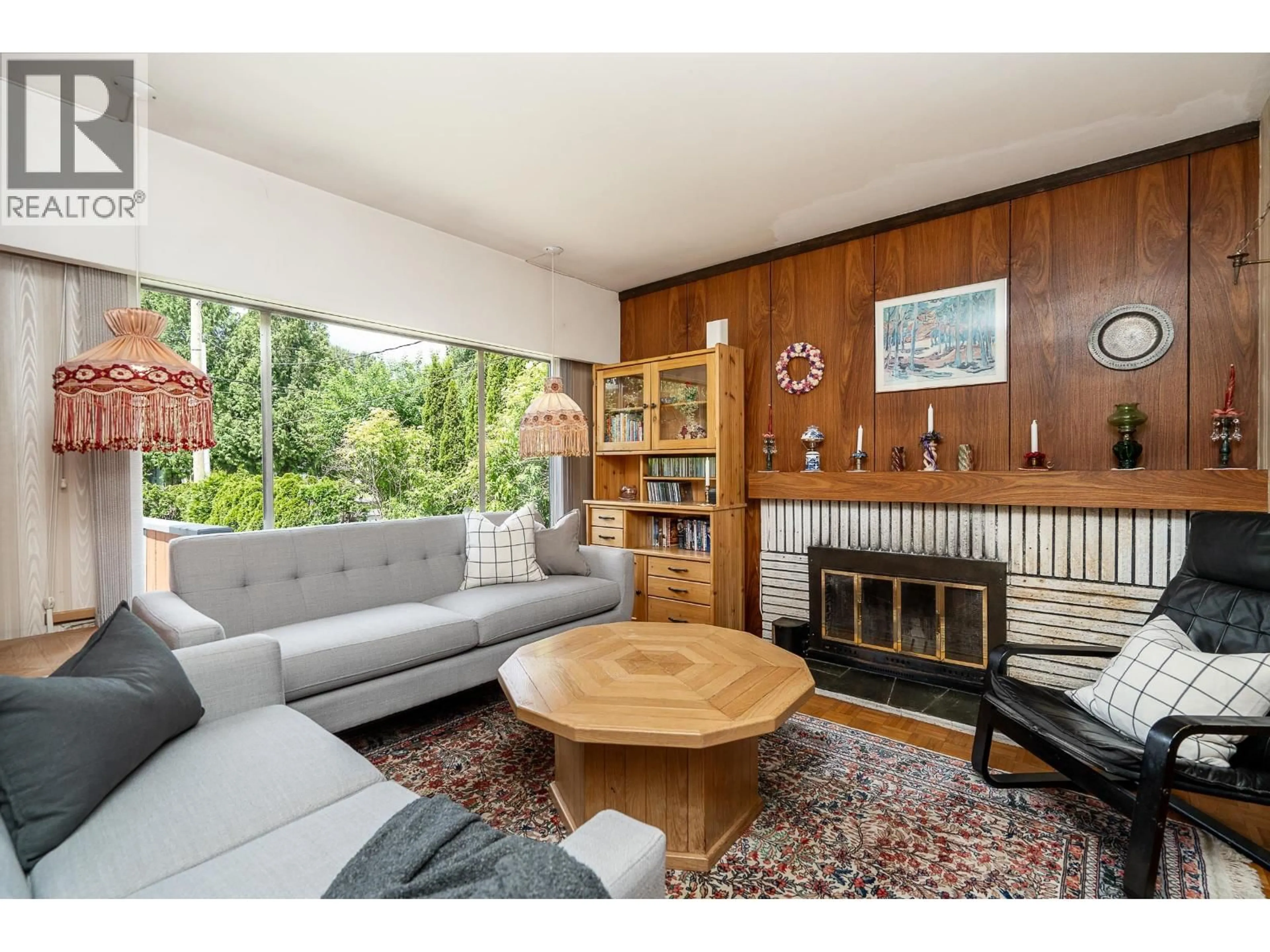 Living room with furniture, wood/laminate floor for 3554 HASTINGS STREET, Port Coquitlam British Columbia V3B4N4