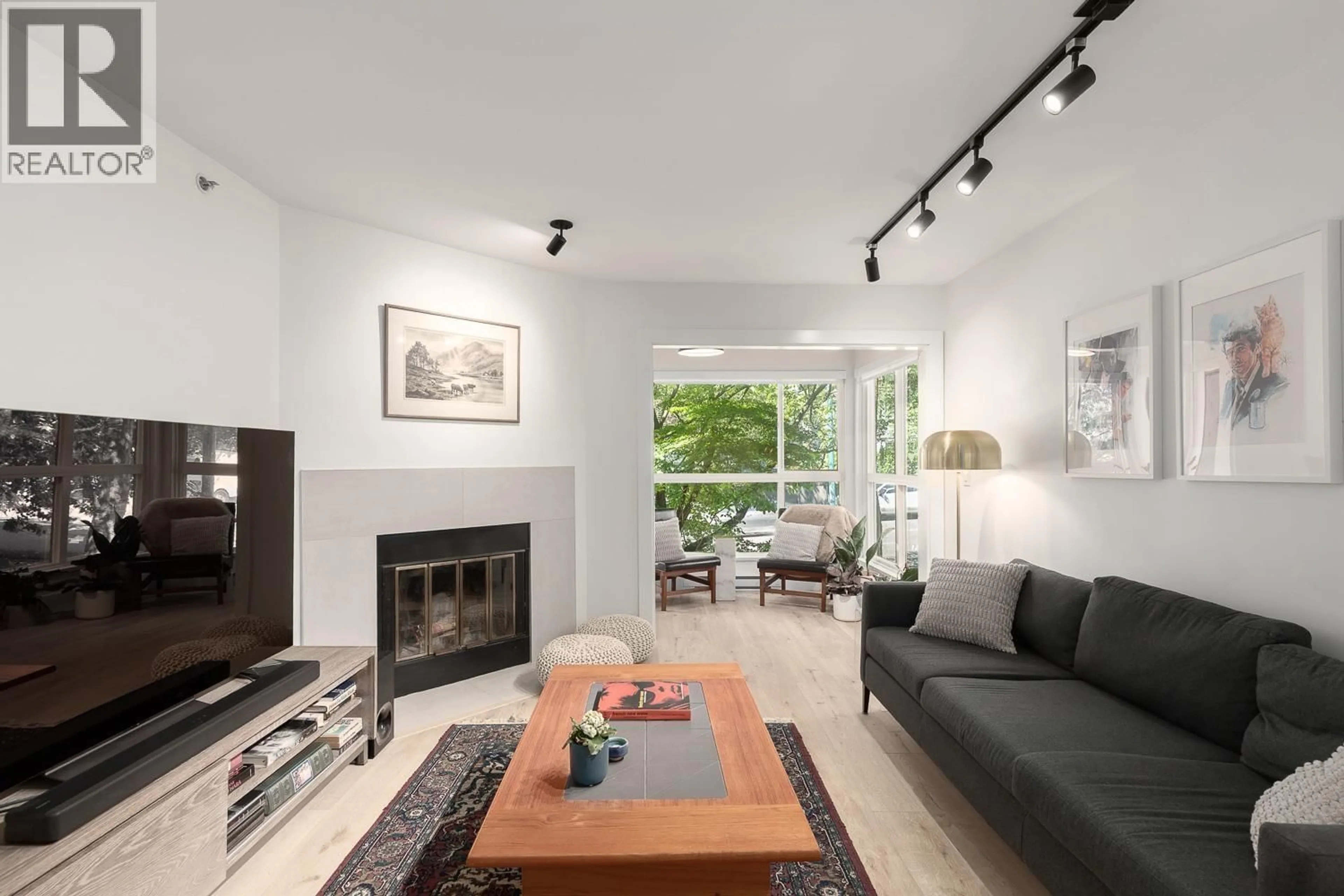 Living room with furniture, unknown for 203 - 2272 DUNDAS STREET, Vancouver British Columbia V5L1J8