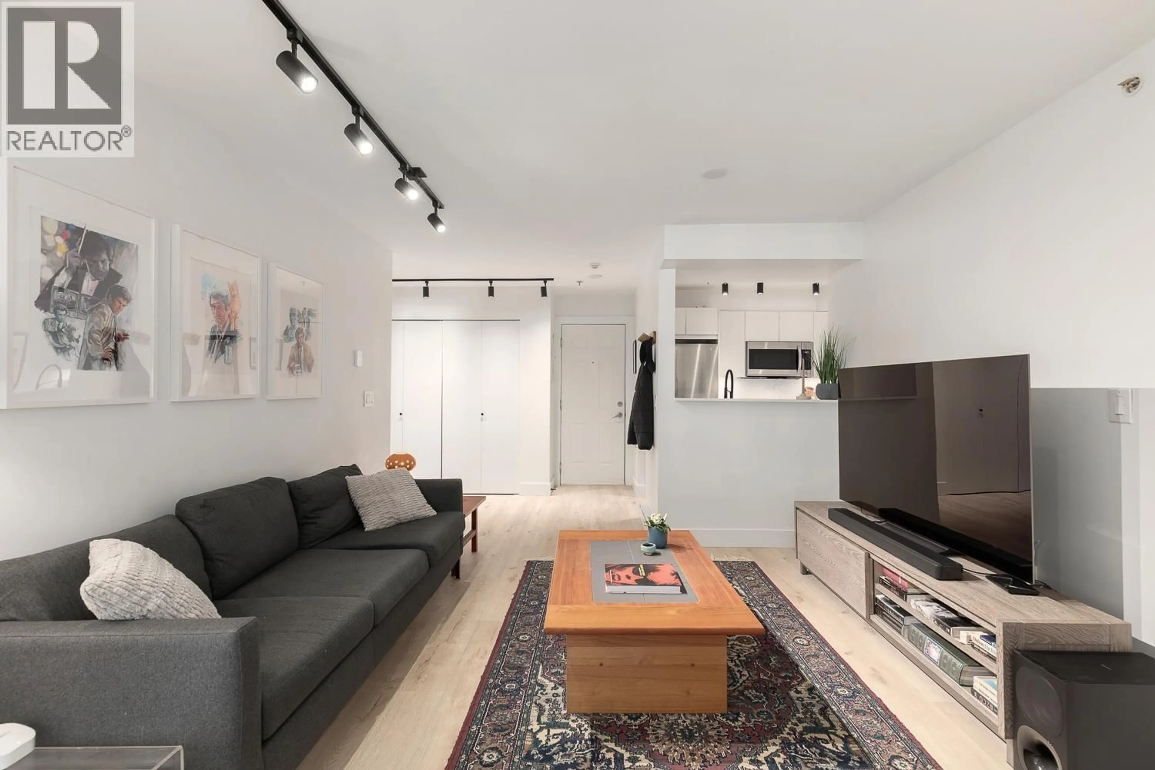 Living room with furniture, unknown for 203 - 2272 DUNDAS STREET, Vancouver British Columbia V5L1J8