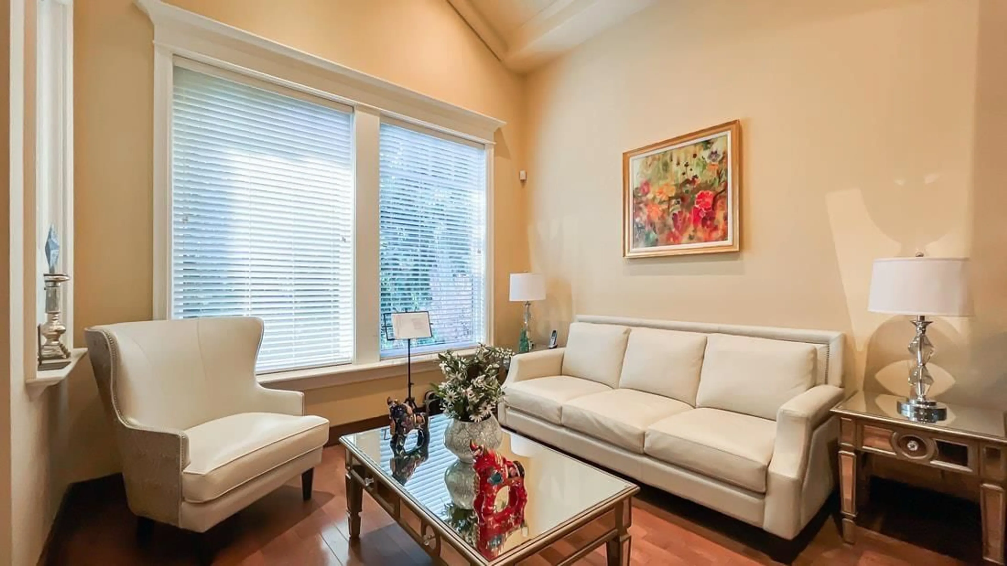 Living room with furniture, wood/laminate floor for 3470 144 STREET, Surrey British Columbia V4P2A1
