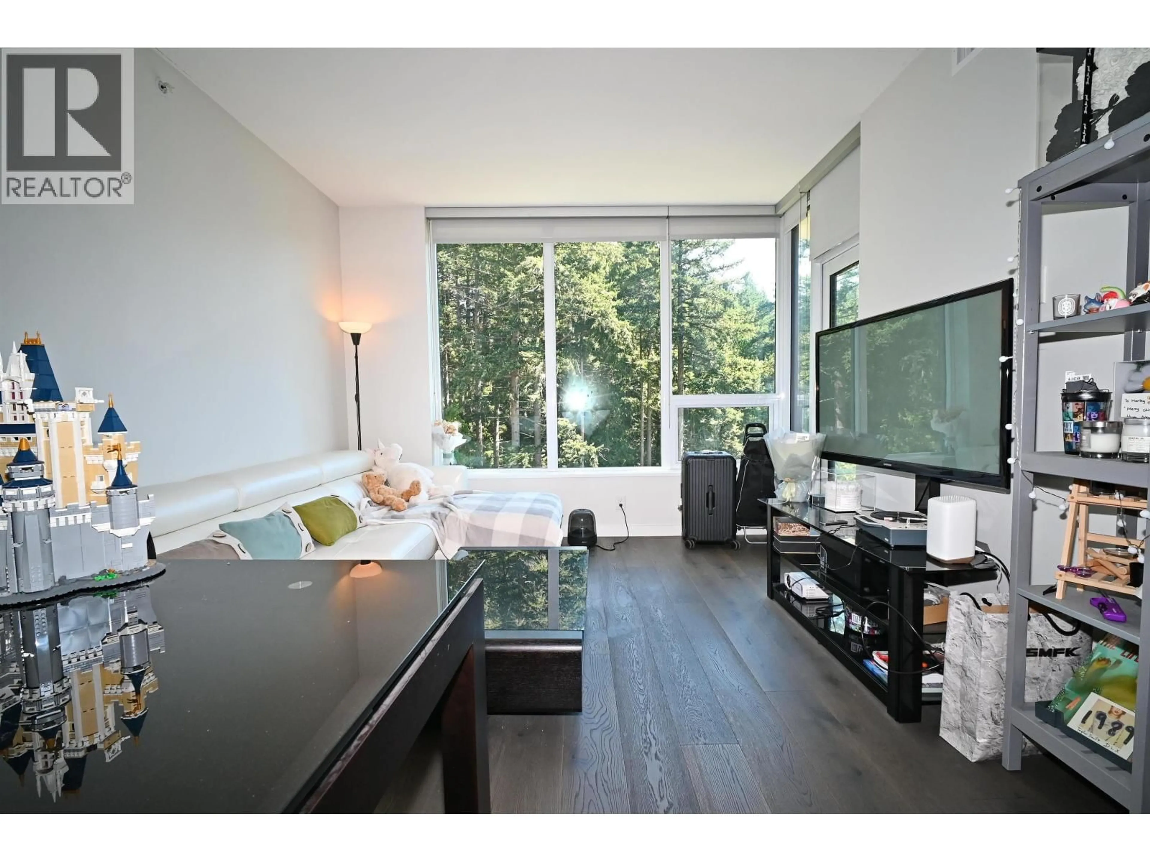 Living room with furniture, wood/laminate floor for 907 - 3487 BINNING ROAD, Vancouver British Columbia V6S0K8