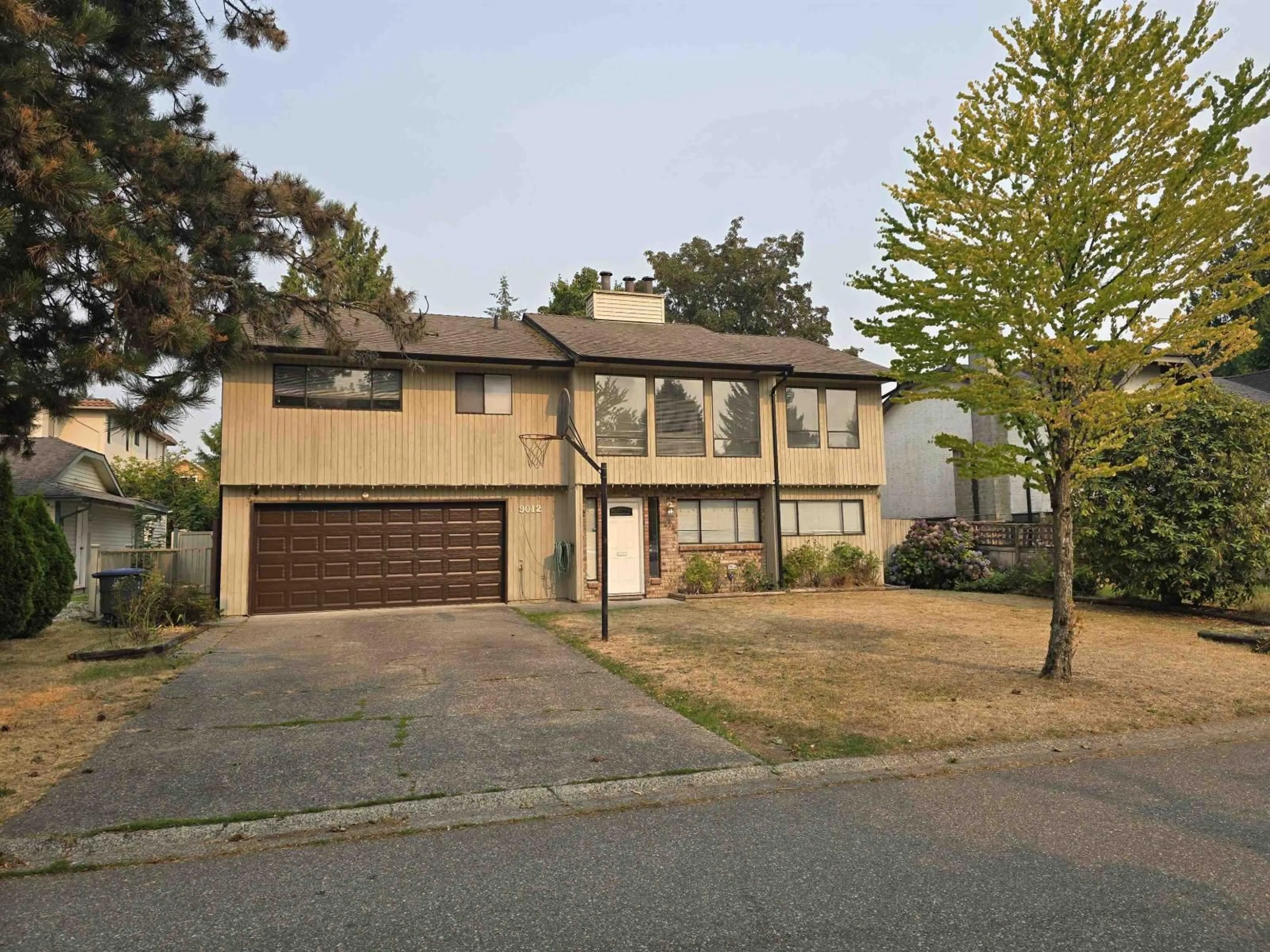 A pic from outside/outdoor area/front of a property/back of a property/a pic from drone, street for 9012 145A STREET, Surrey British Columbia V3R7Y4