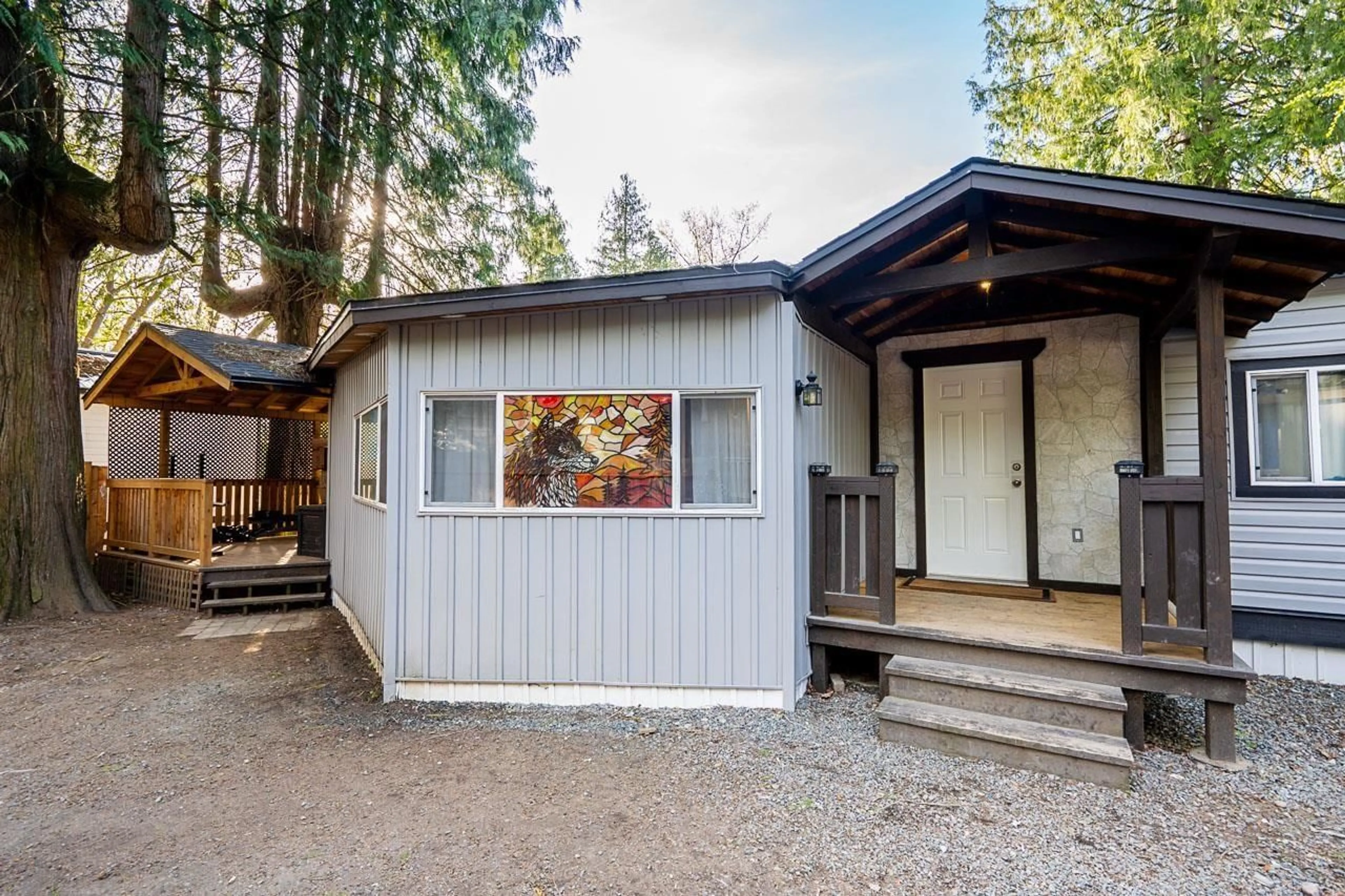 Home with vinyl exterior material, street for 1 - 10235 BEAVER DRIVE, Chilliwack British Columbia V0X1X1