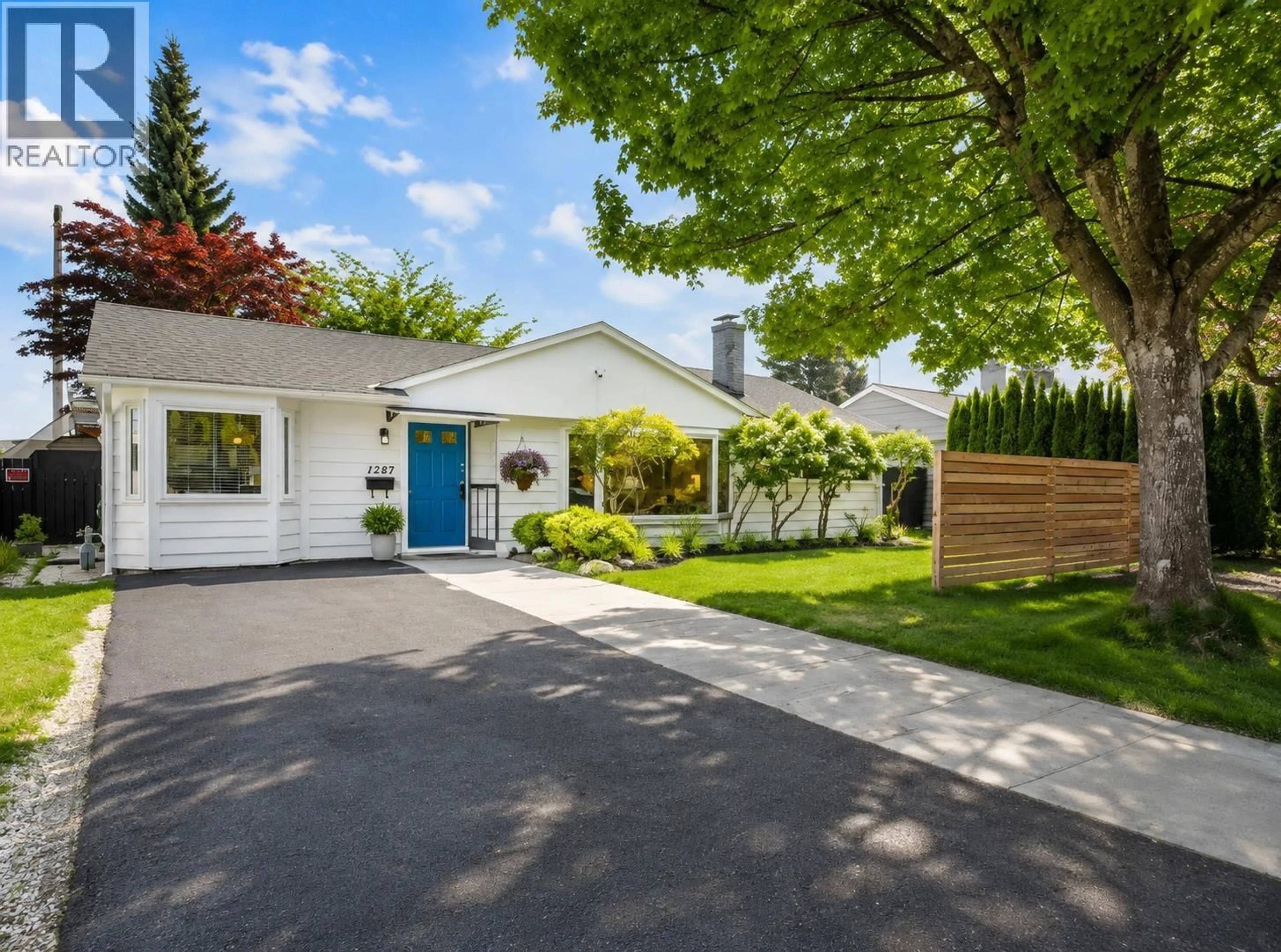Home with vinyl exterior material, street for 1287 W 15TH STREET, North Vancouver British Columbia V7P1N1