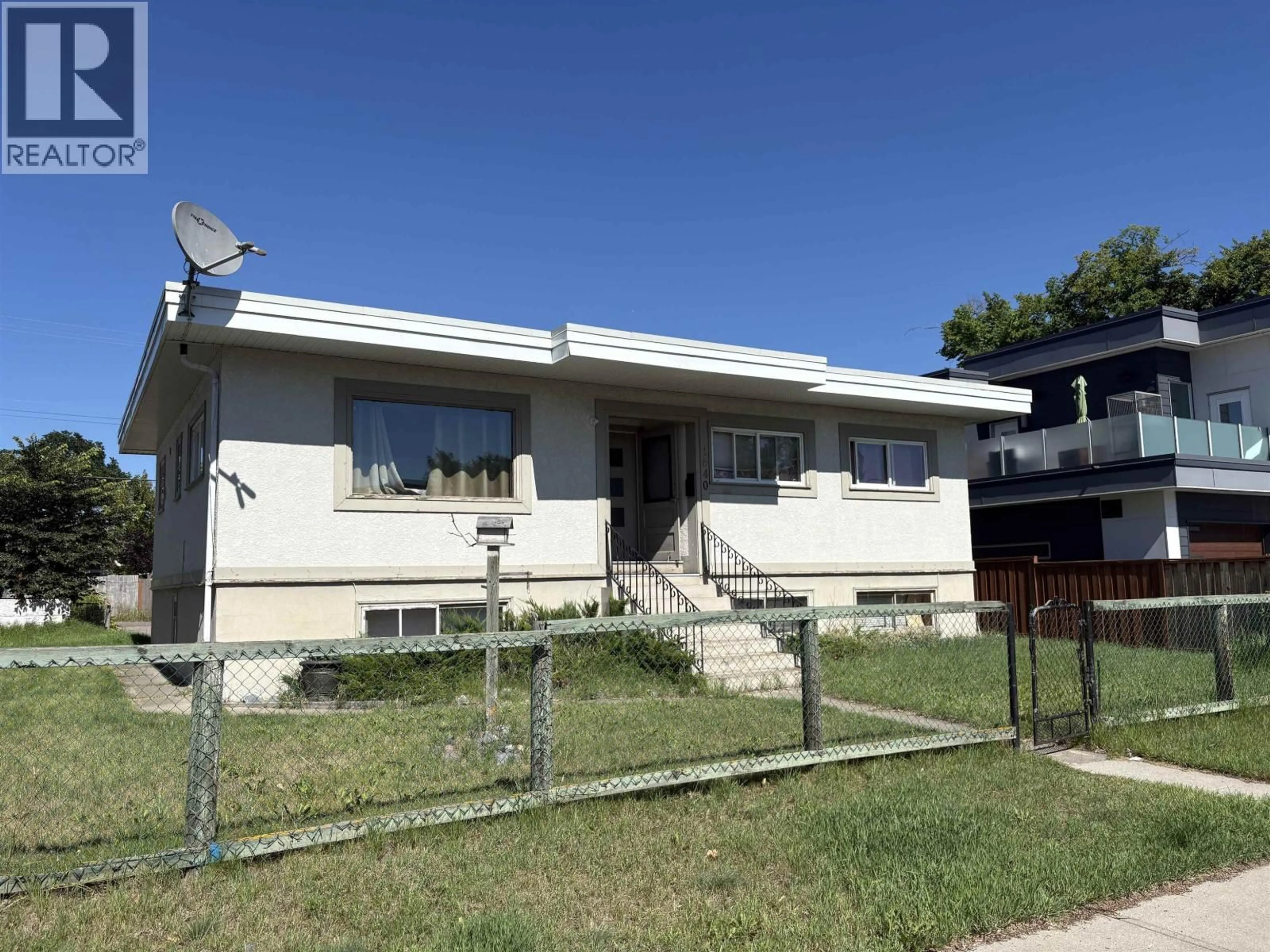 Home with vinyl exterior material, street for 1640 8TH AVENUE, Prince George British Columbia V2L3R5