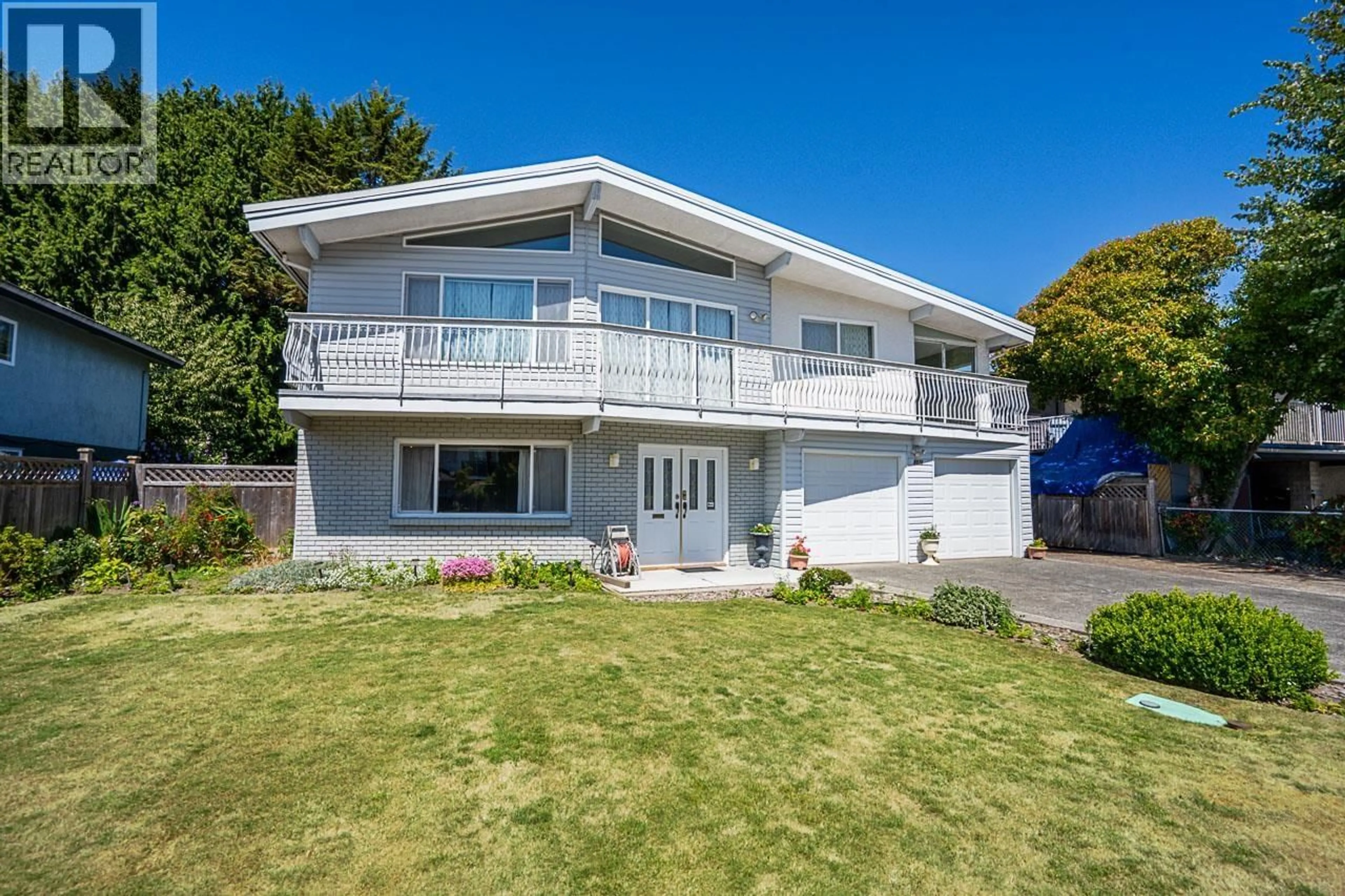 Home with vinyl exterior material, street for 8571 GREENFIELD DRIVE, Richmond British Columbia V7A4M2