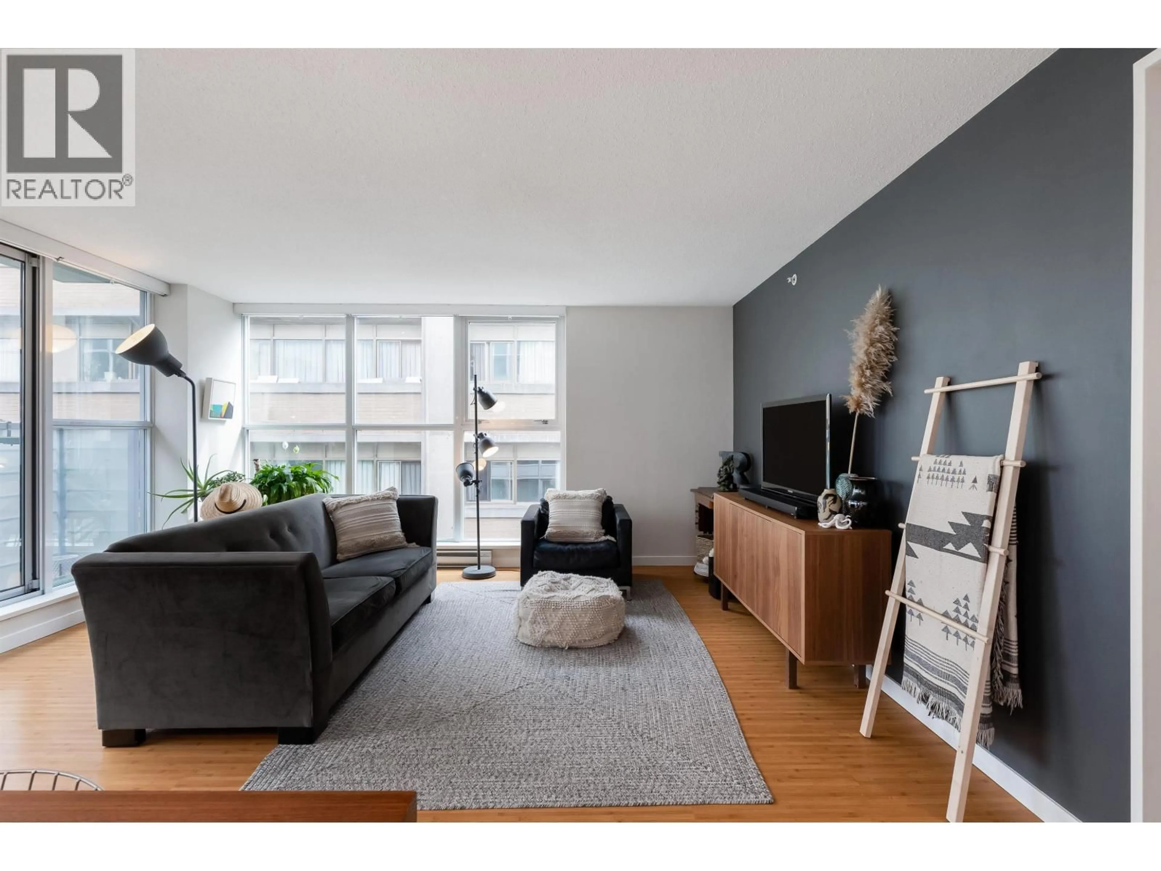 Living room with furniture, wood/laminate floor for 601 - 168 POWELL STREET, Vancouver British Columbia V6A0B2