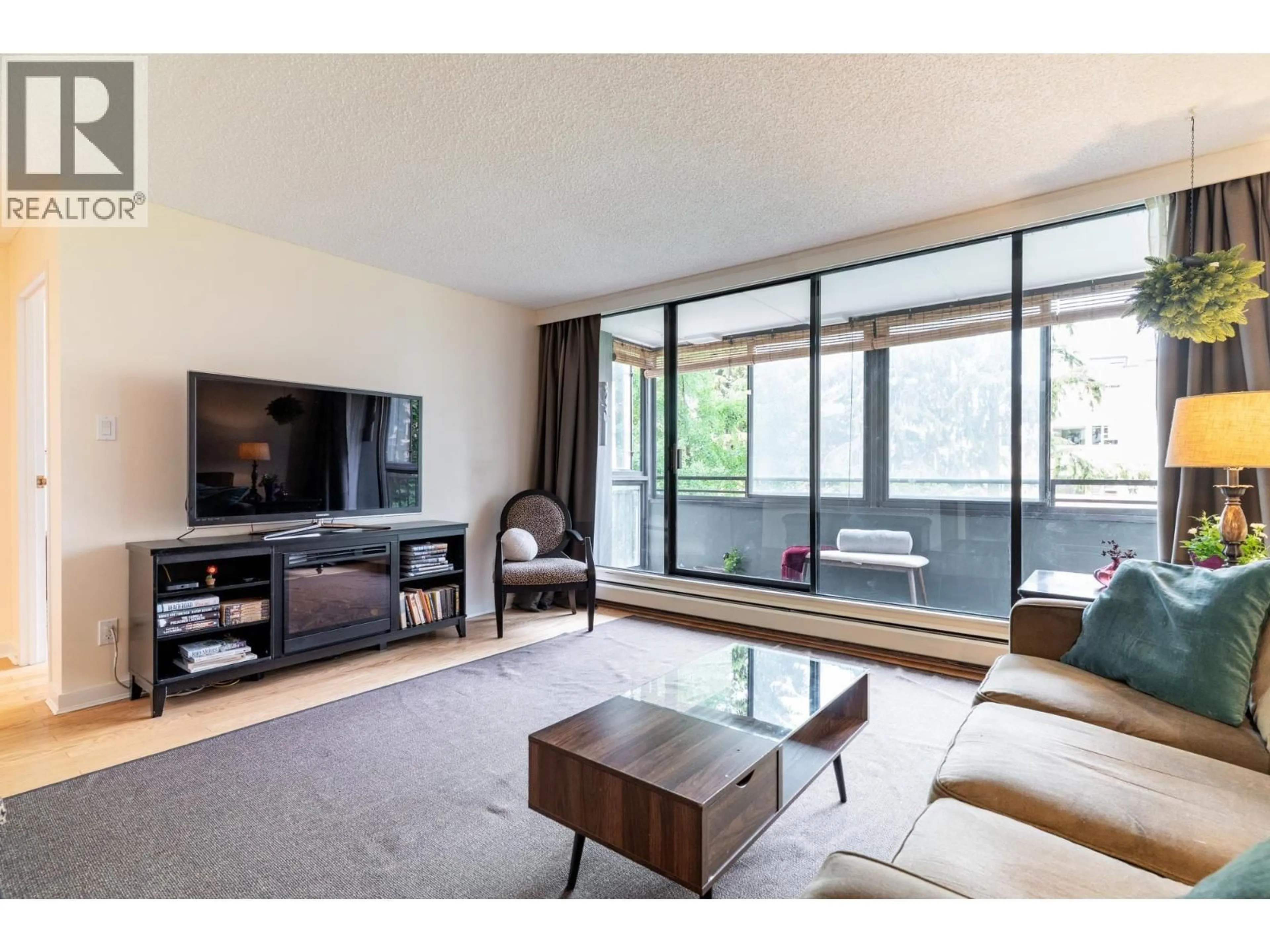 Living room with furniture, unknown for 405 - 1816 HARO STREET, Vancouver British Columbia V6G2Y7