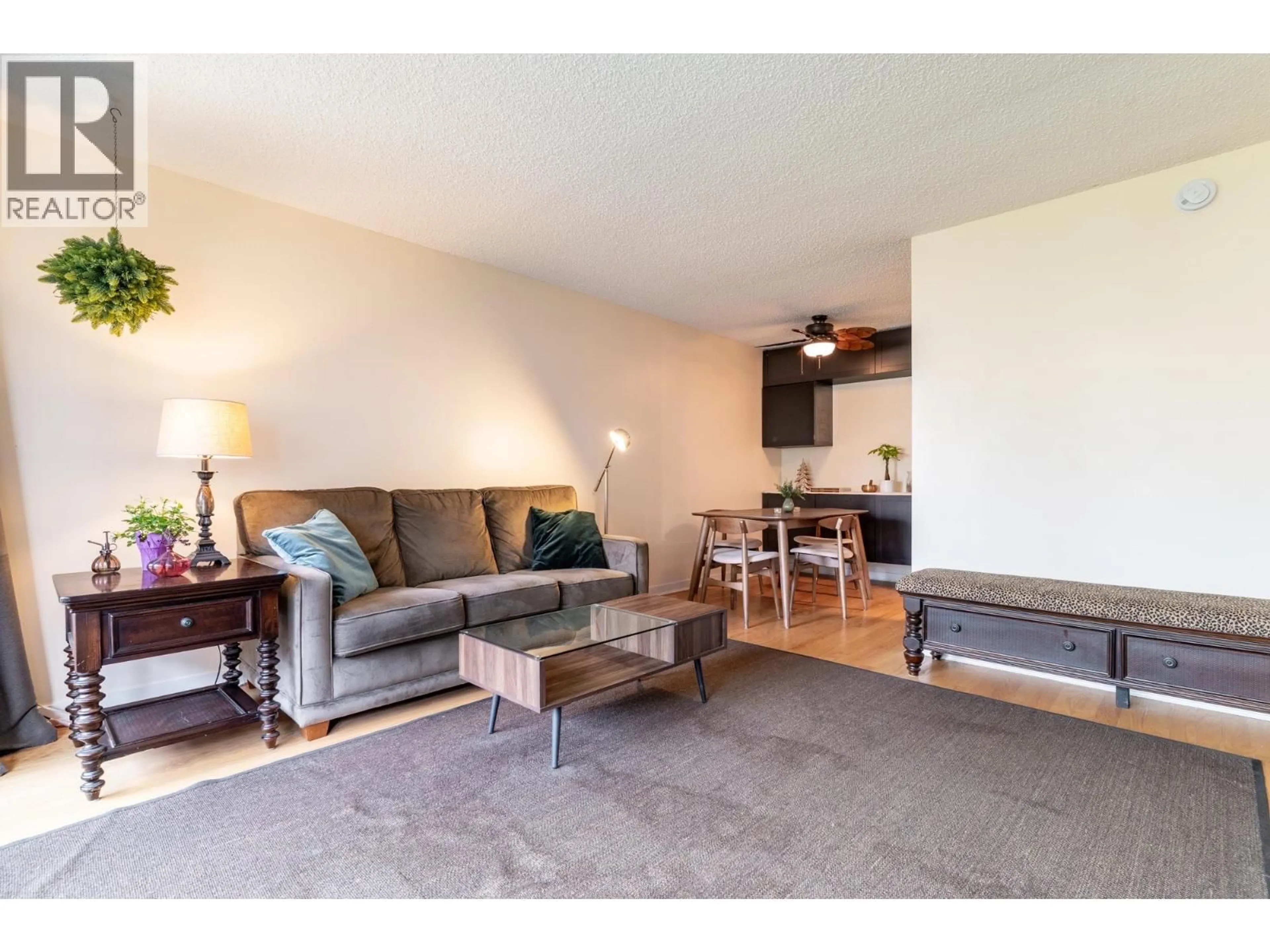 Living room with furniture, wood/laminate floor for 405 - 1816 HARO STREET, Vancouver British Columbia V6G2Y7