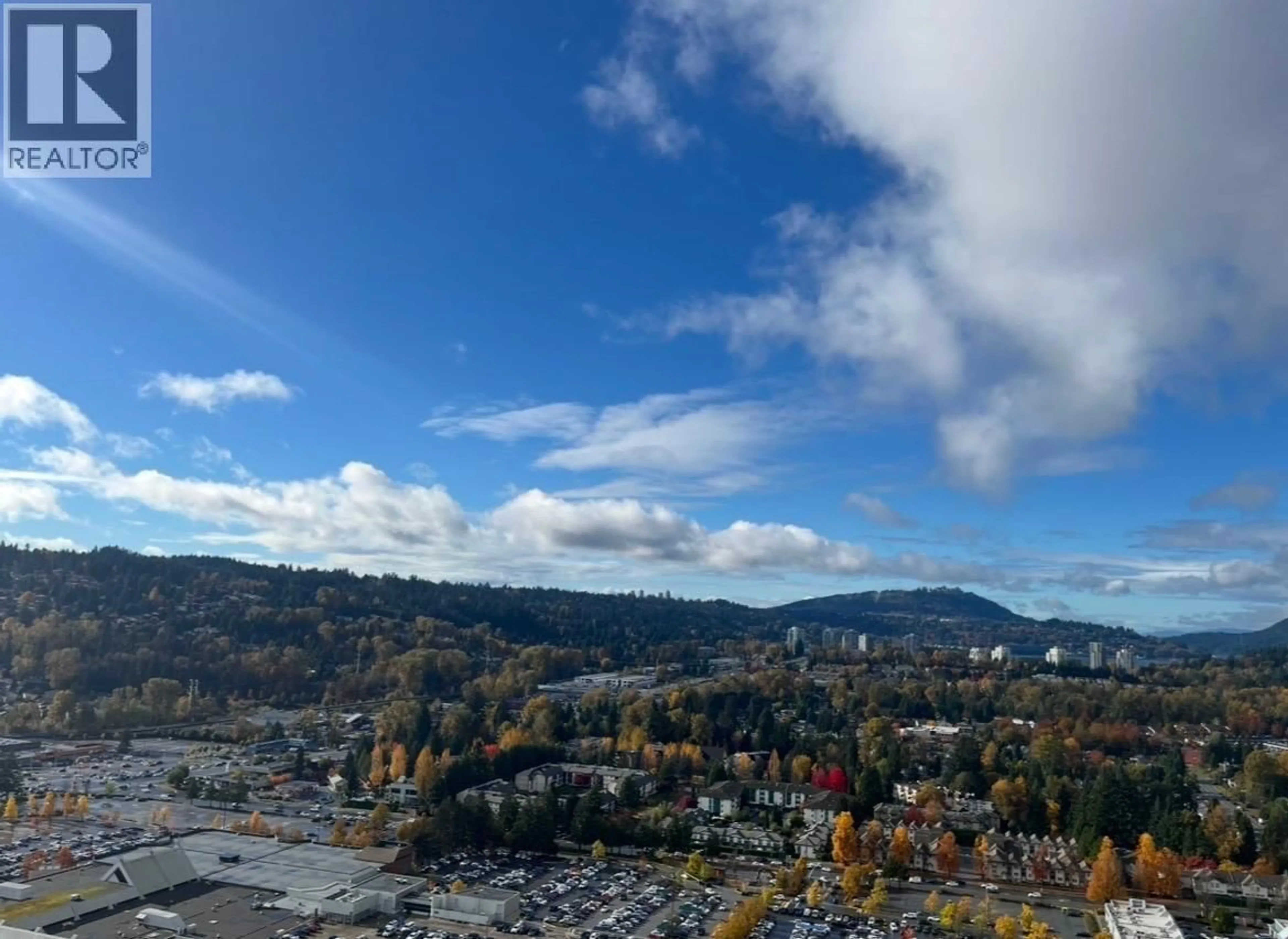 A pic from outside/outdoor area/front of a property/back of a property/a pic from drone, mountain view for 3704 - 2980 ATLANTIC AVENUE, Coquitlam British Columbia V3B0G2
