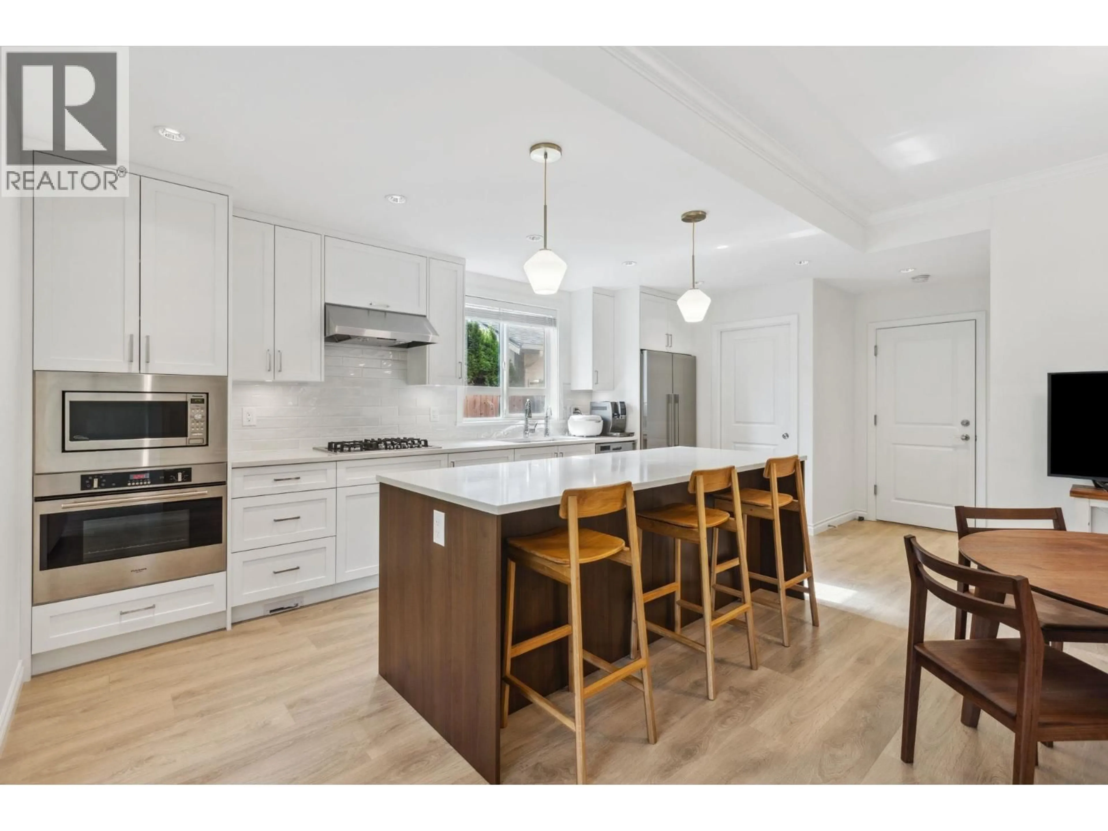 Open concept kitchen, wood/laminate floor for 11 - 10611 GILBERT ROAD, Richmond British Columbia V7E2H4