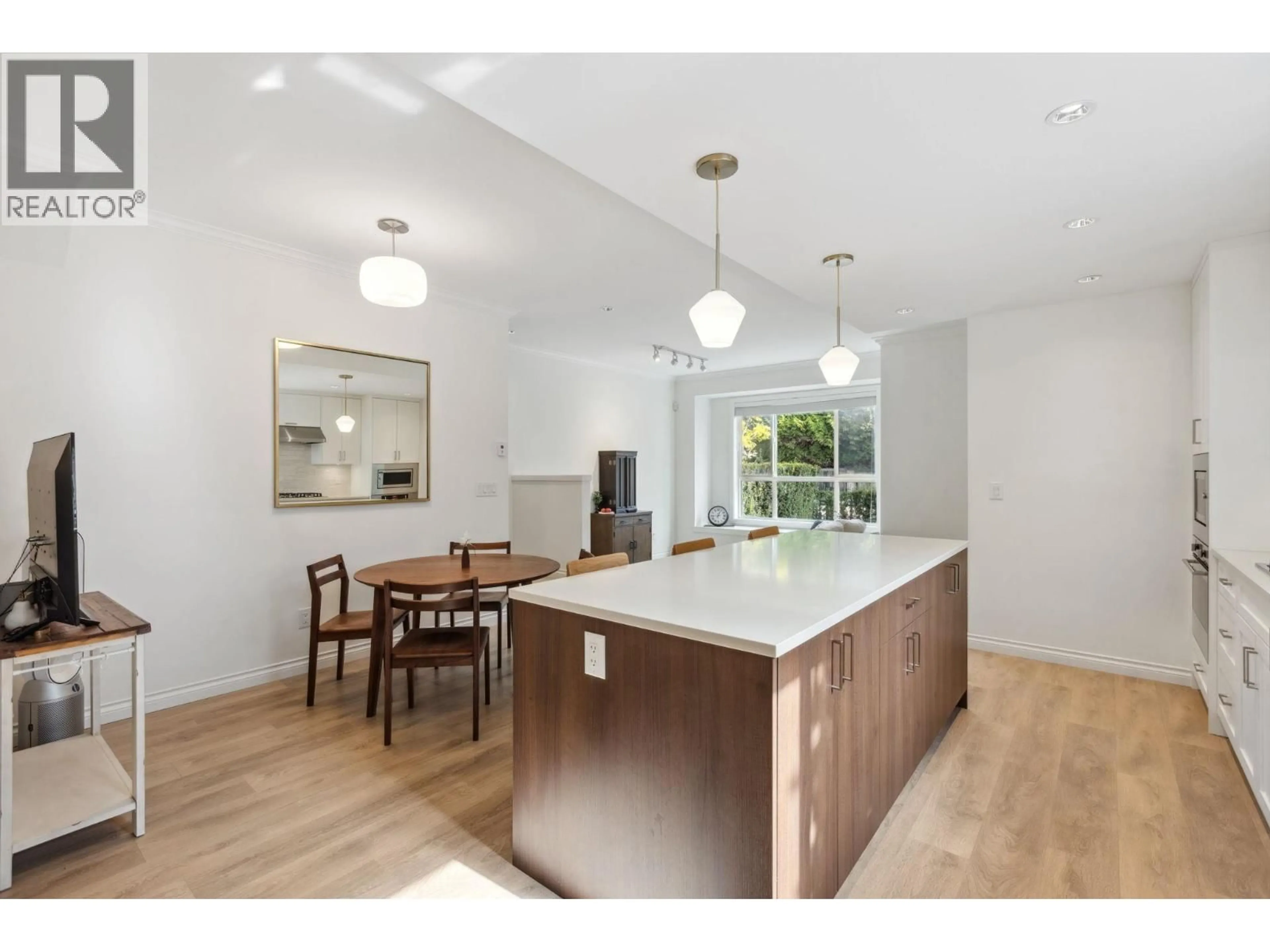 Open concept kitchen, wood/laminate floor for 11 - 10611 GILBERT ROAD, Richmond British Columbia V7E2H4