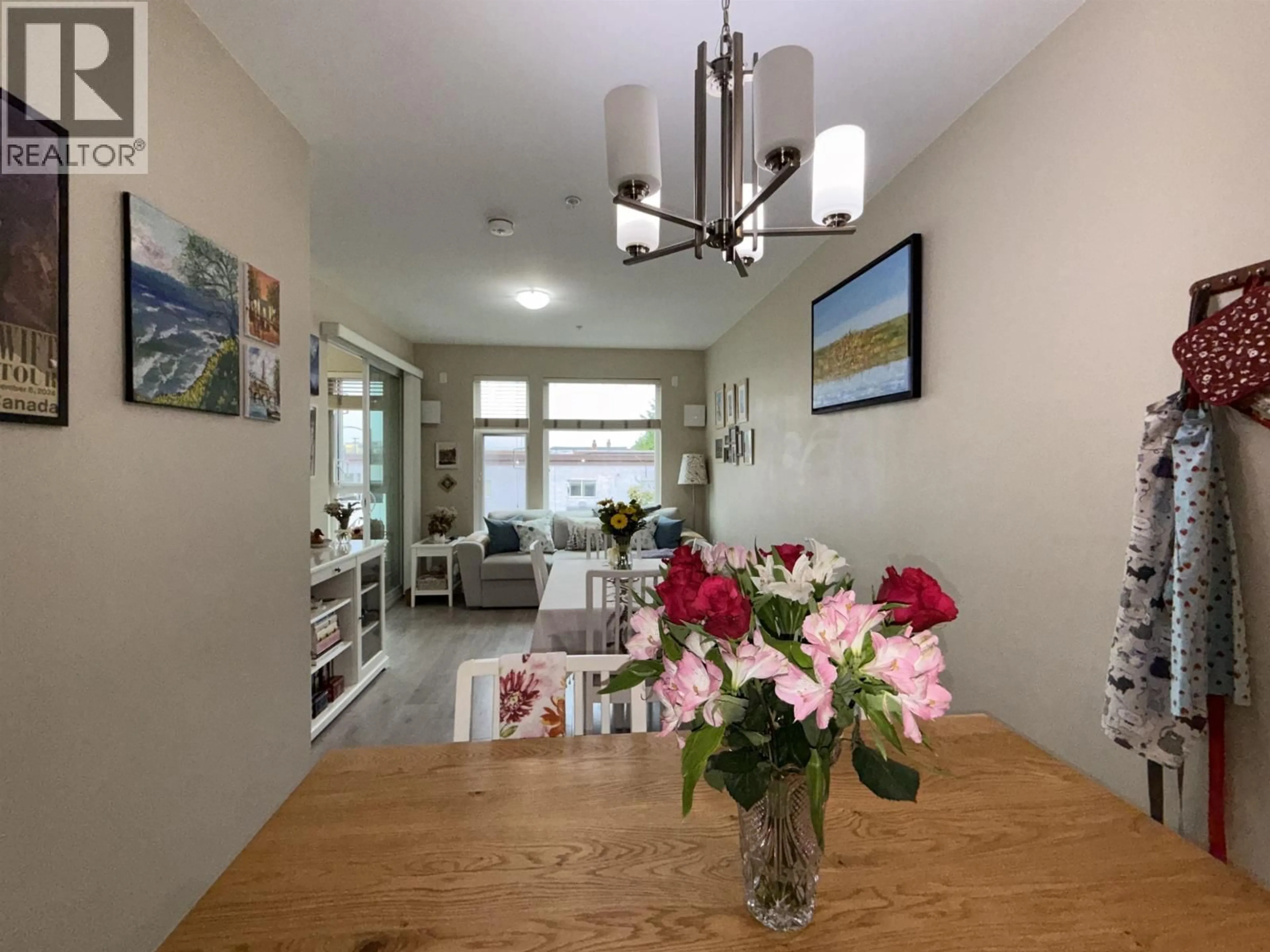 Dining room, wood/laminate floor for 206 - 1838 RENFREW STREET, Vancouver British Columbia V5M3H9