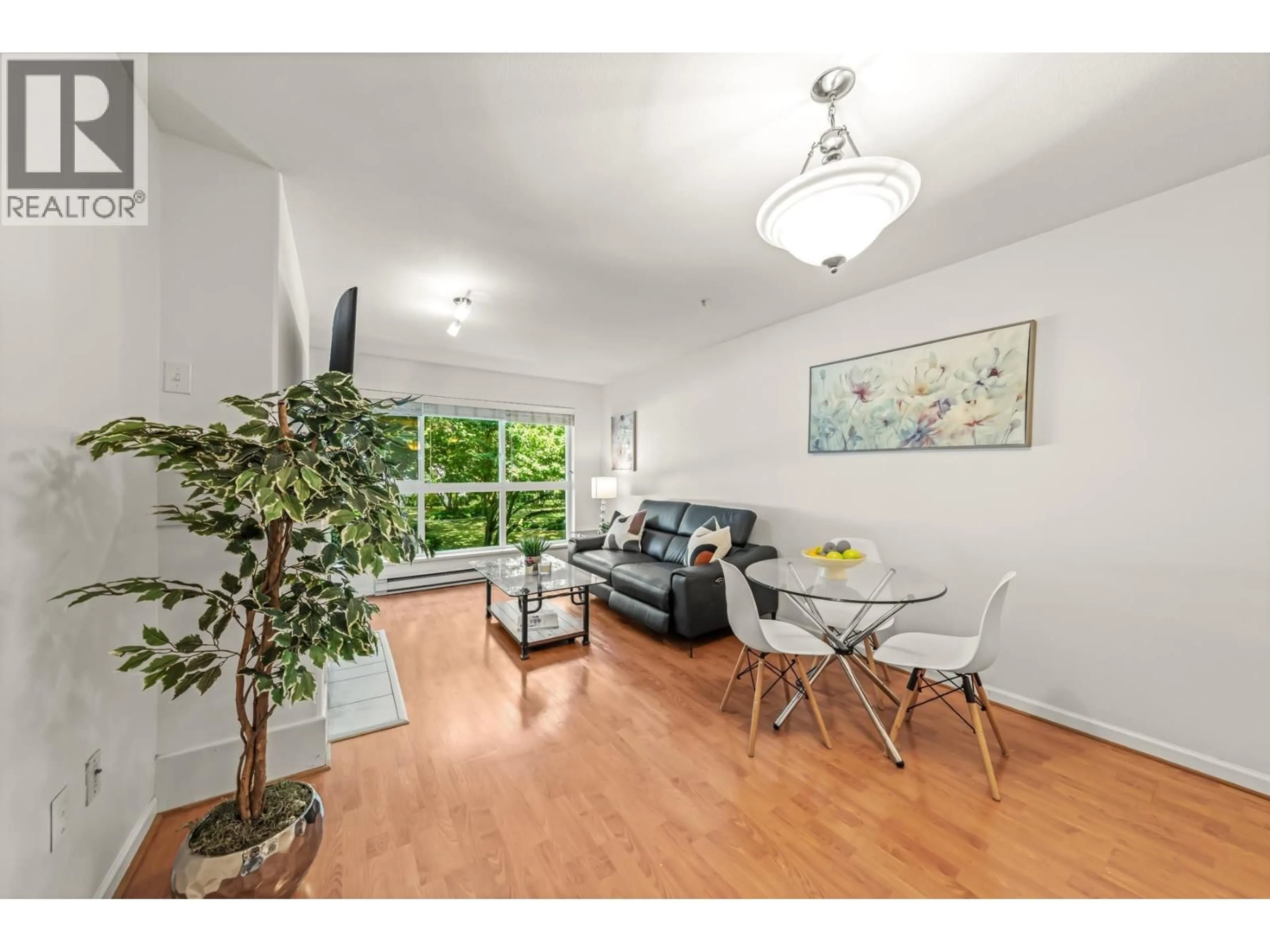 Living room with furniture, wood/laminate floor for 205 - 5900 DOVER CRESCENT, Richmond British Columbia V7C5R4