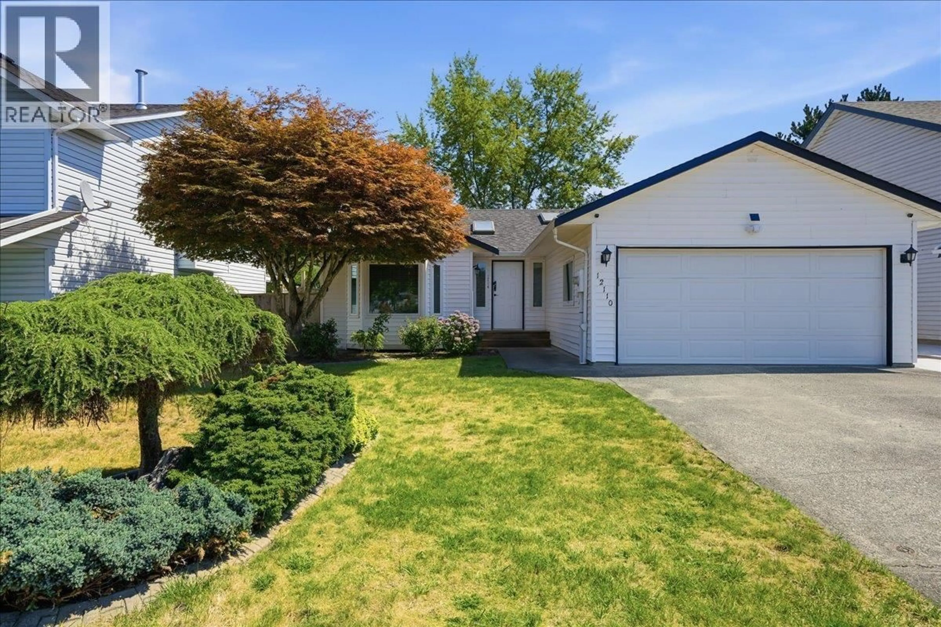 Home with vinyl exterior material, street for 12110 BLOSSOM STREET, Maple Ridge British Columbia V2X9J9