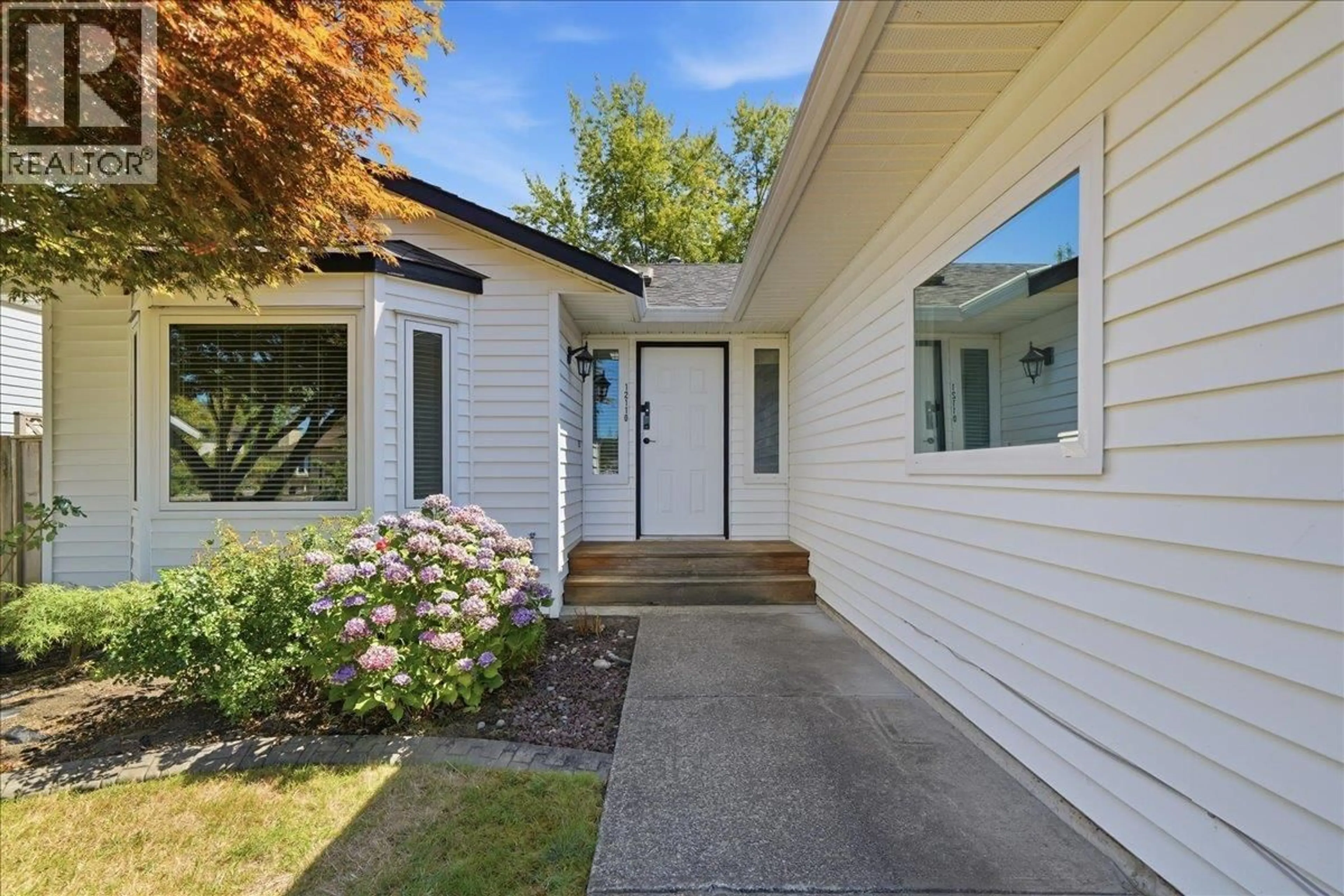 Home with vinyl exterior material, street for 12110 BLOSSOM STREET, Maple Ridge British Columbia V2X9J9