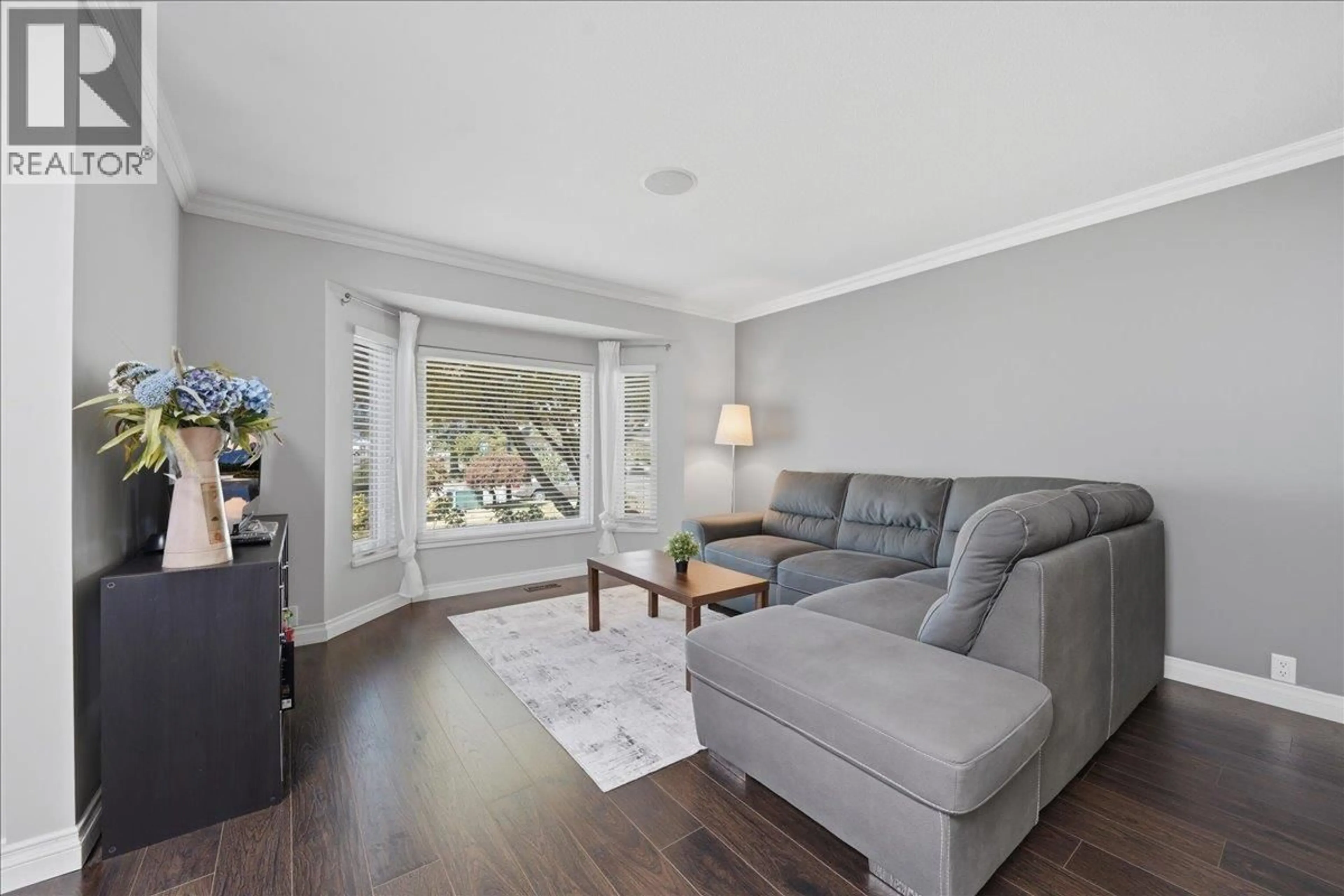 Living room with furniture, wood/laminate floor for 12110 BLOSSOM STREET, Maple Ridge British Columbia V2X9J9