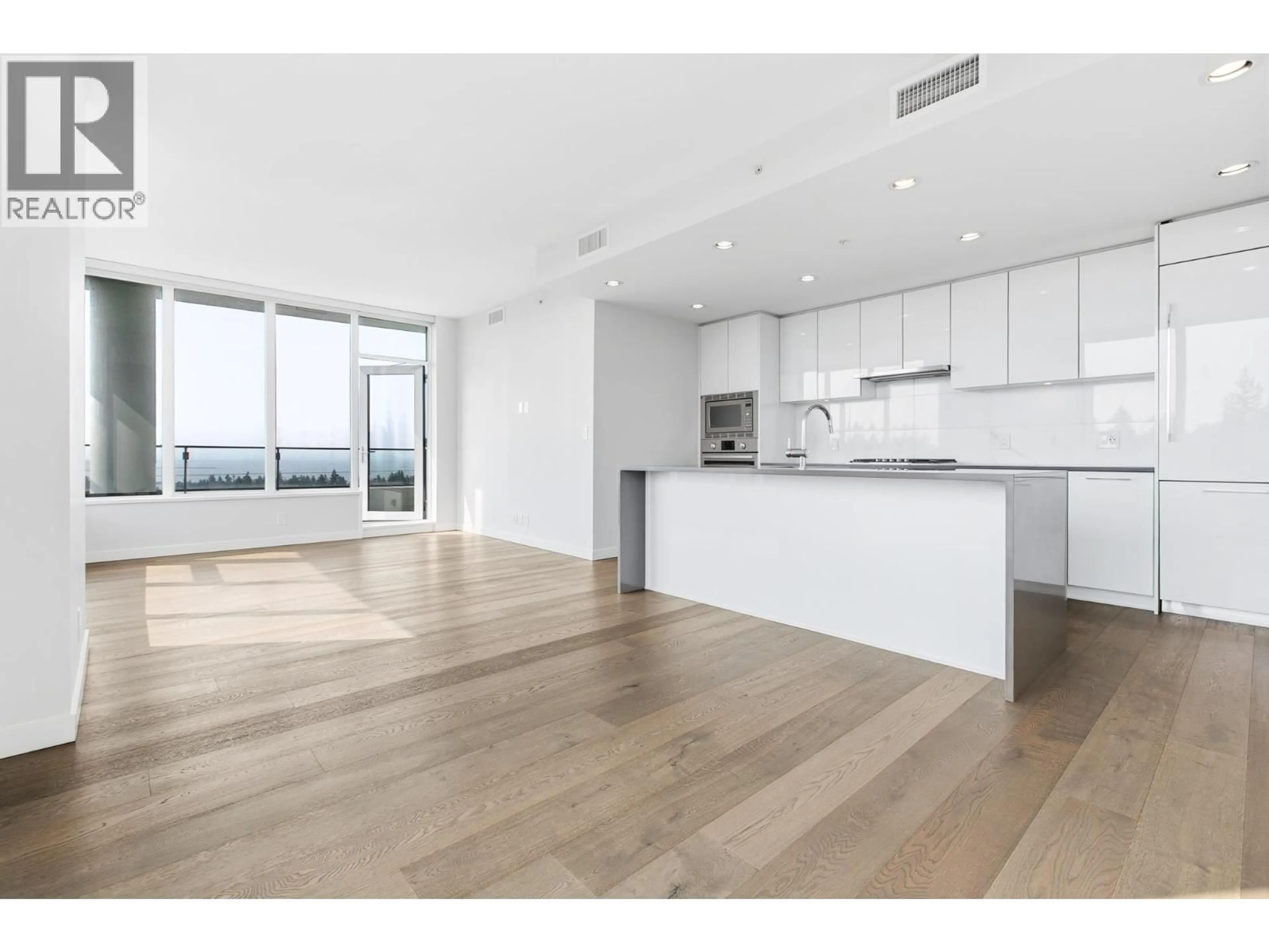 Open concept kitchen, wood/laminate floor for 1908 - 3487 BINNING ROAD, Vancouver British Columbia V6S0K8