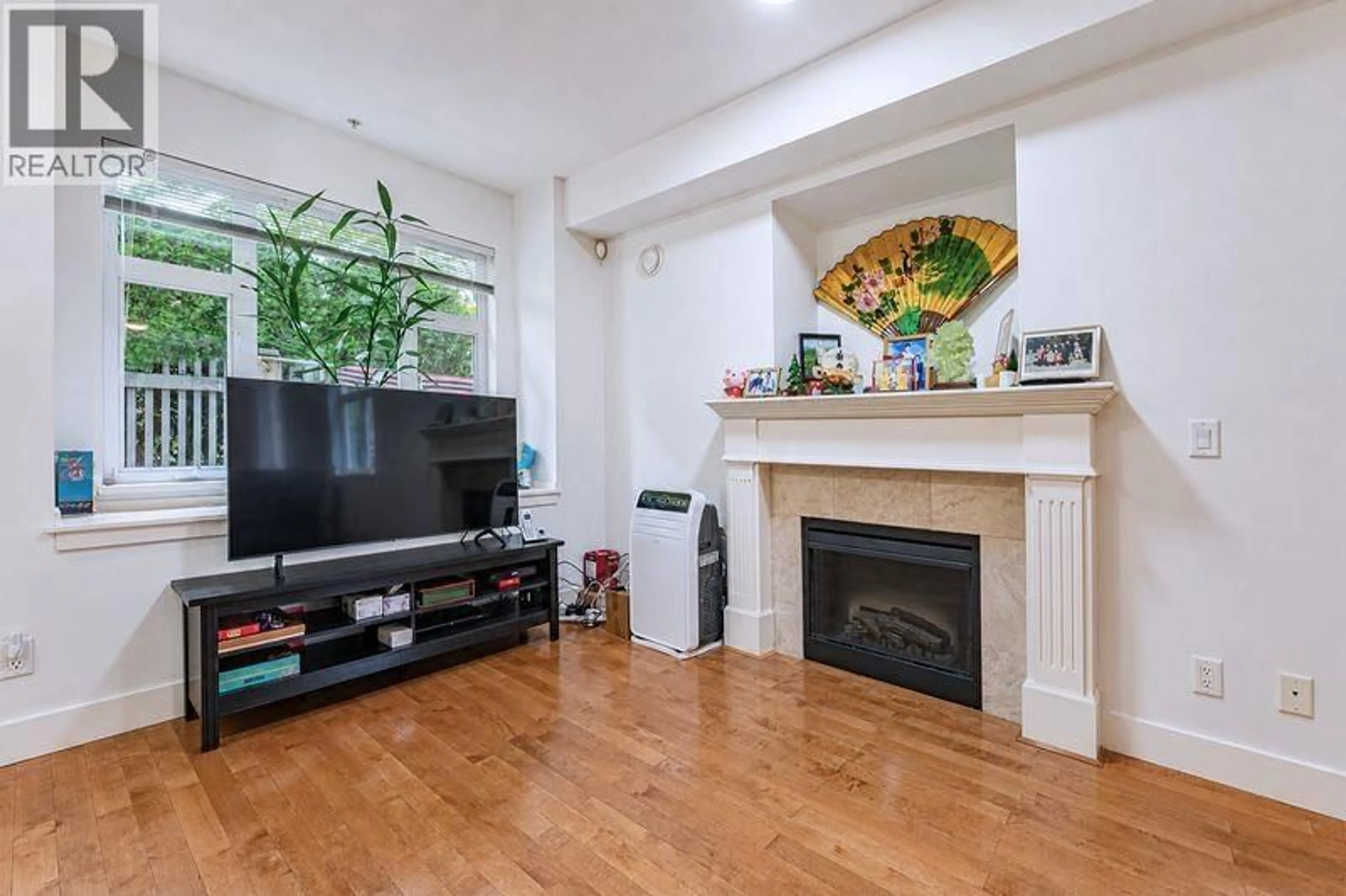 Living room with furniture, wood/laminate floor for 306 - 4468 ALBERT STREET, Burnaby British Columbia V5C2G2