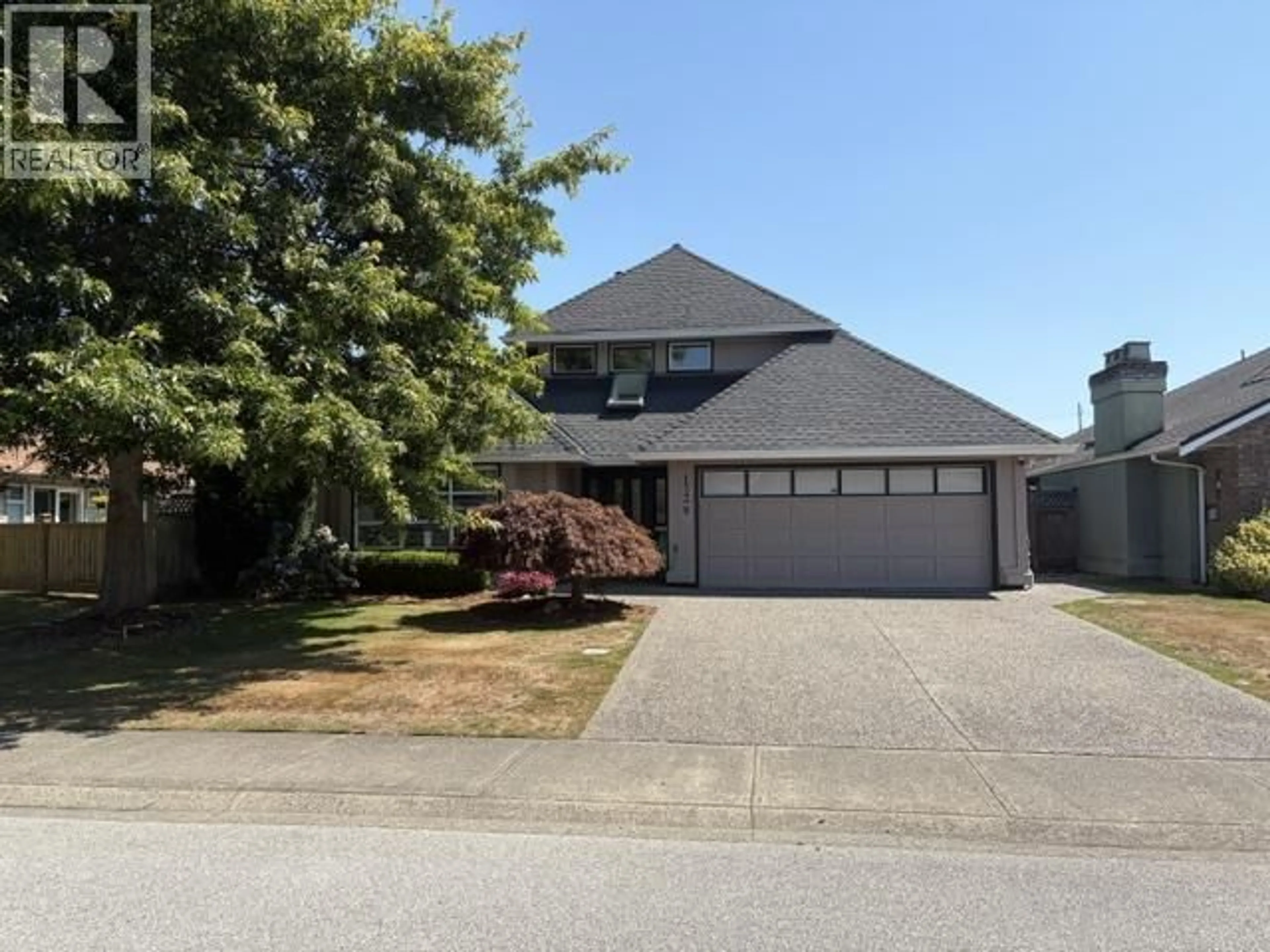 Home with vinyl exterior material, street for 1738 GOLF CLUB DRIVE, Delta British Columbia V4M4E2