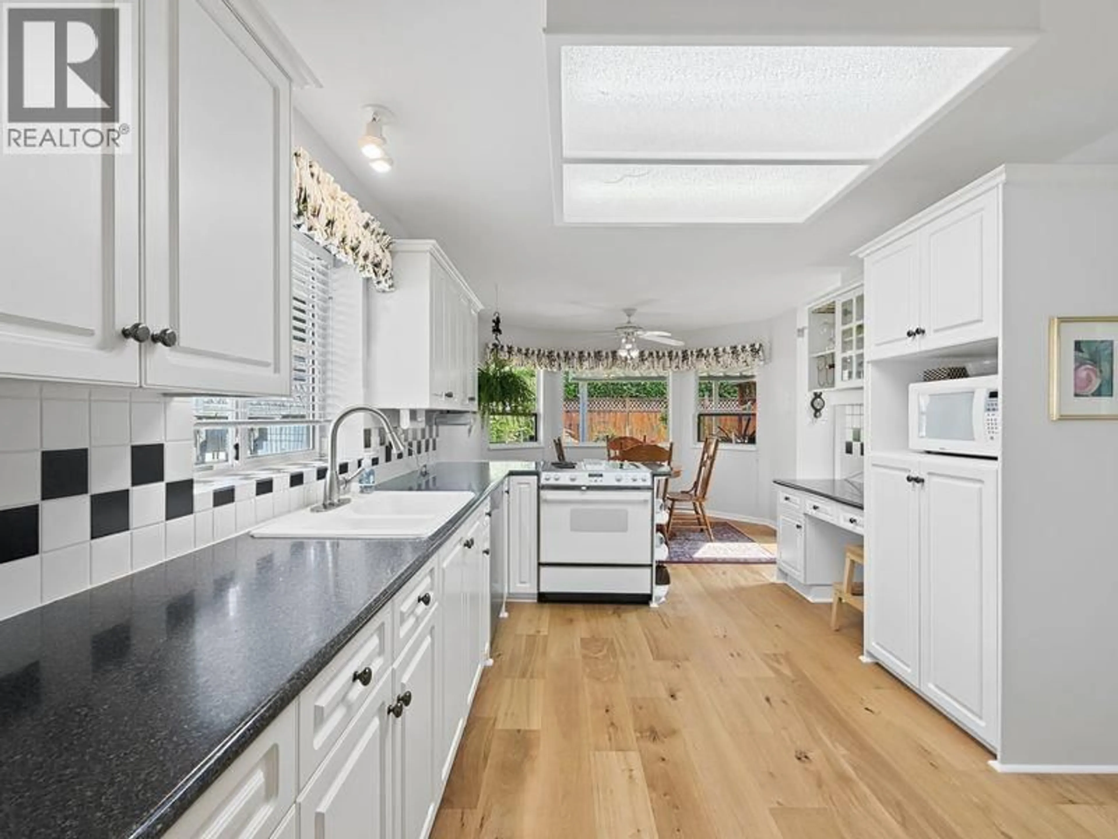 Open concept kitchen, ceramic/tile floor for 1738 GOLF CLUB DRIVE, Delta British Columbia V4M4E2