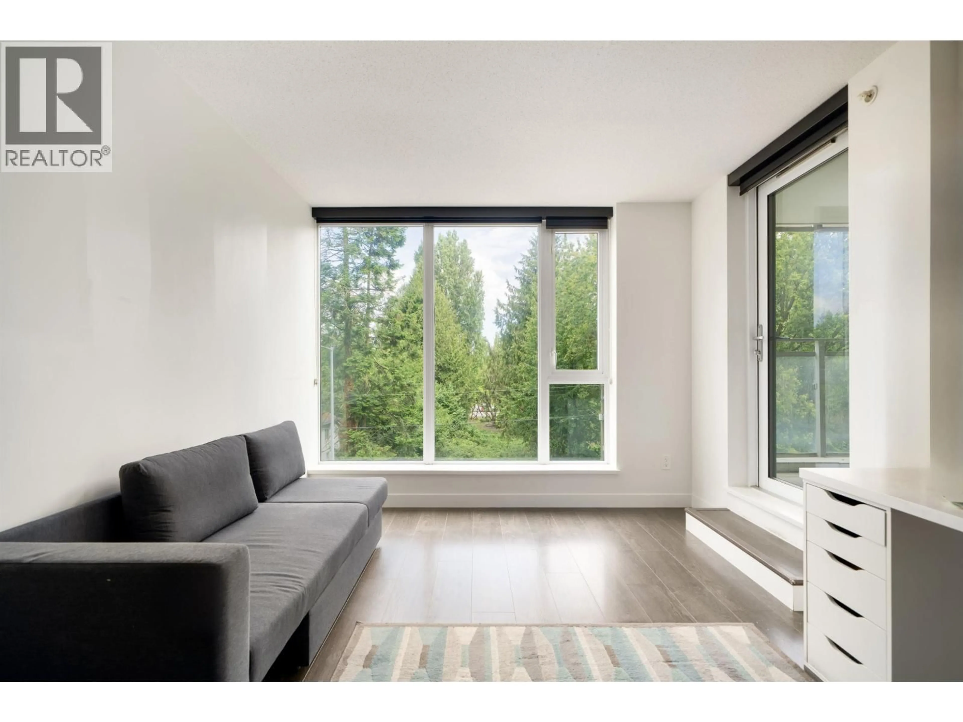 Living room with furniture, wood/laminate floor for 506 - 8988 PATTERSON ROAD, Richmond British Columbia V6X0R2