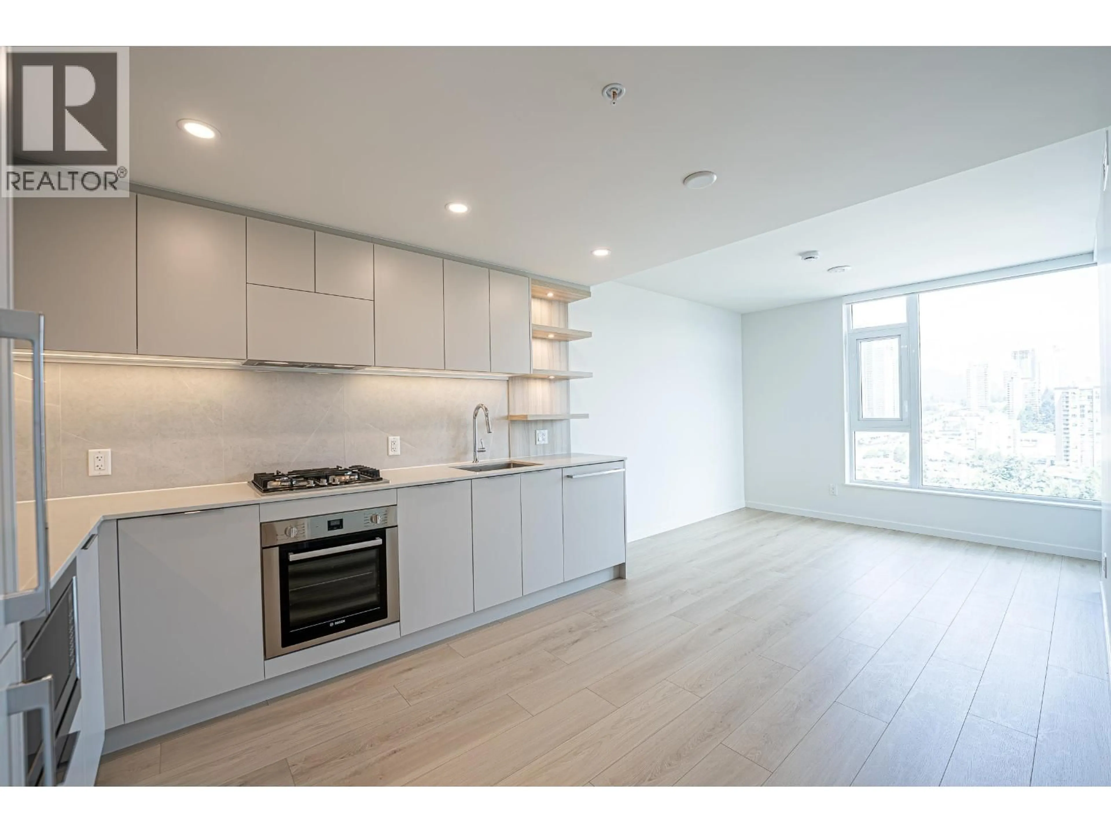 Open concept kitchen, wood/laminate floor for 1904 - 311 ALDERSON AVENUE, Coquitlam British Columbia V3K0K3