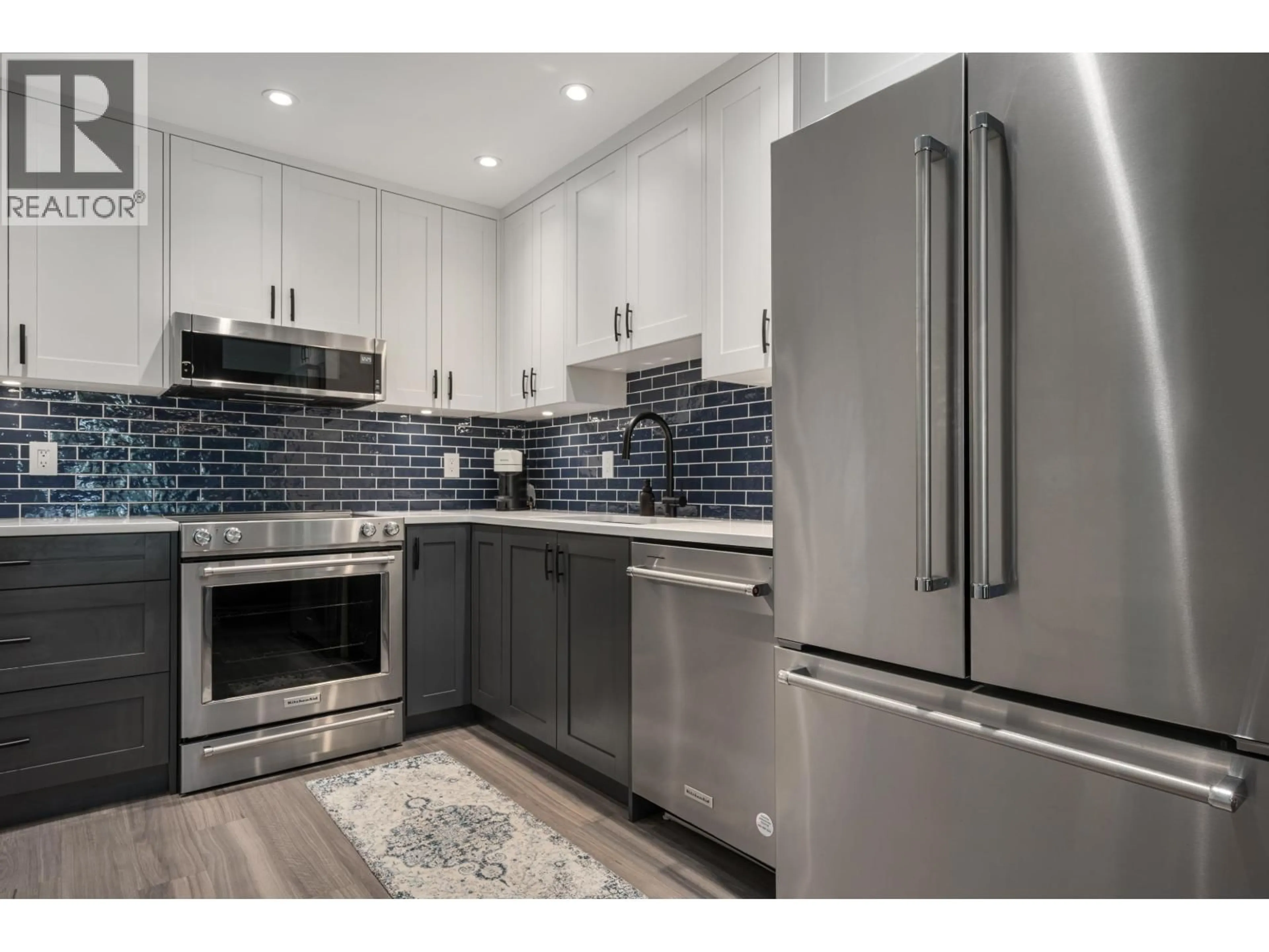 Open concept kitchen, ceramic/tile floor for 203 - 825 15TH AVENUE, Vancouver British Columbia V5Z1R8