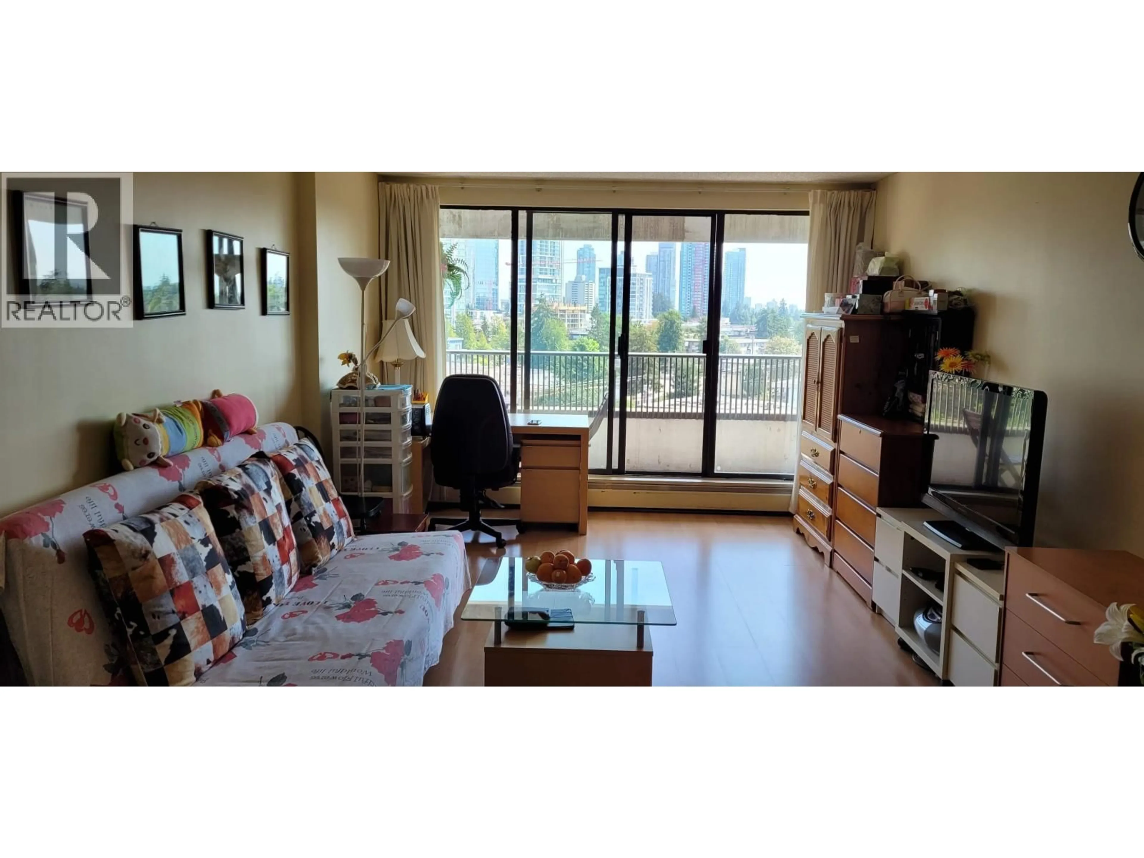 Living room with furniture, wood/laminate floor for 904 - 4194 MAYWOOD STREET, Burnaby British Columbia V5H4E9