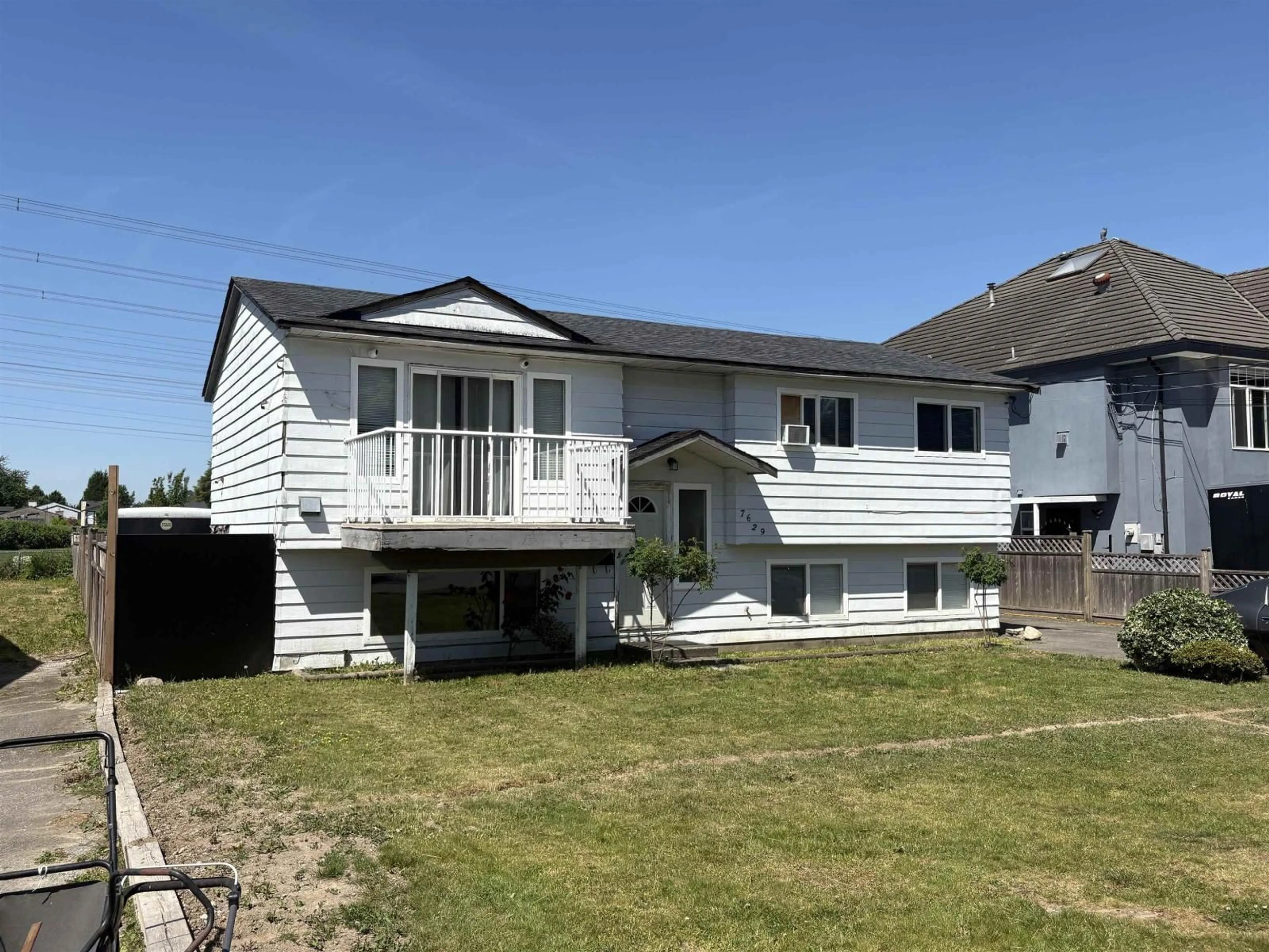 Home with vinyl exterior material, street for 7629 126A STREET, Surrey British Columbia V3W6Z9
