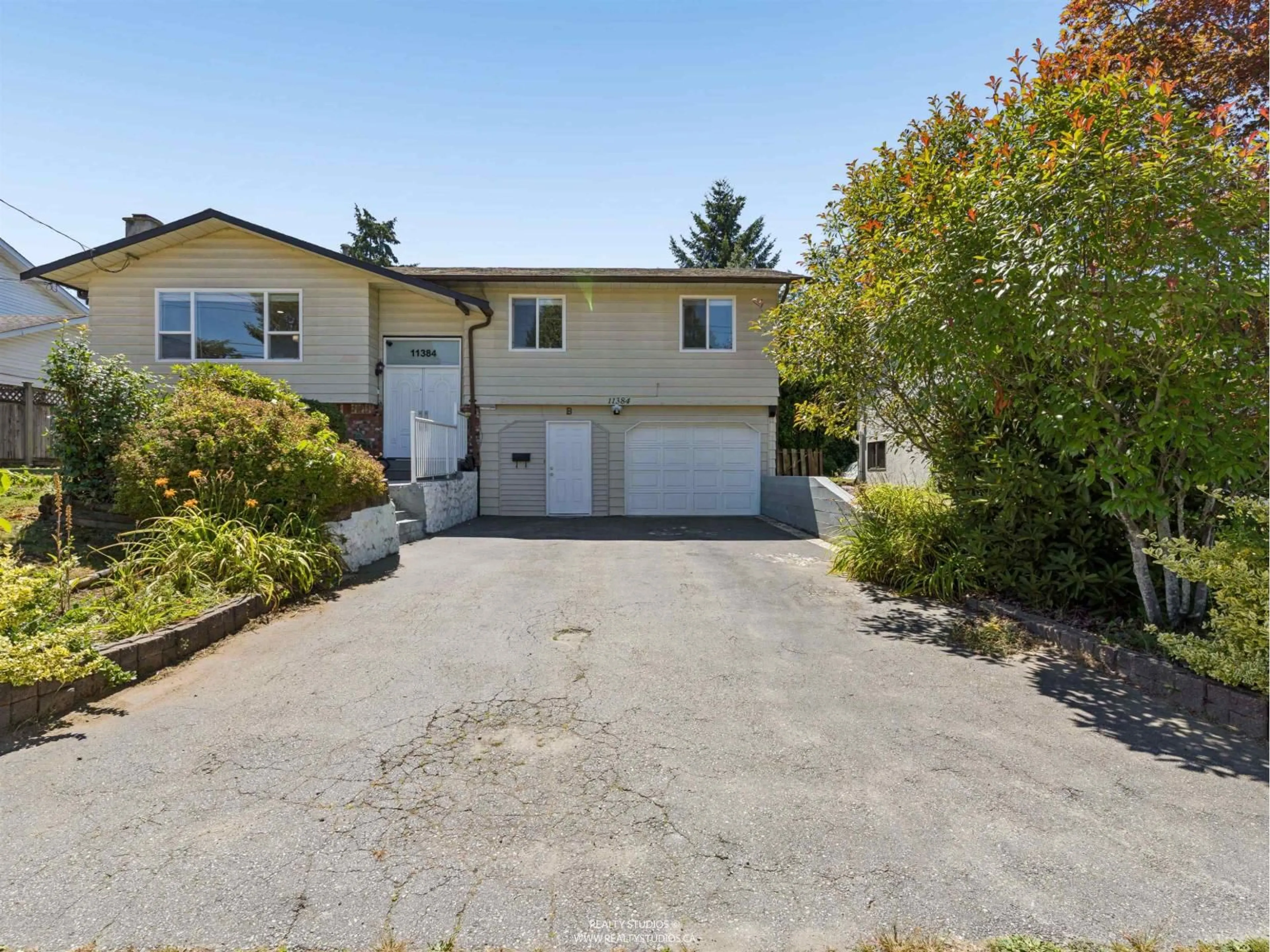 A pic from outside/outdoor area/front of a property/back of a property/a pic from drone, street for 11384 86A AVENUE, Delta British Columbia V4C2Y8