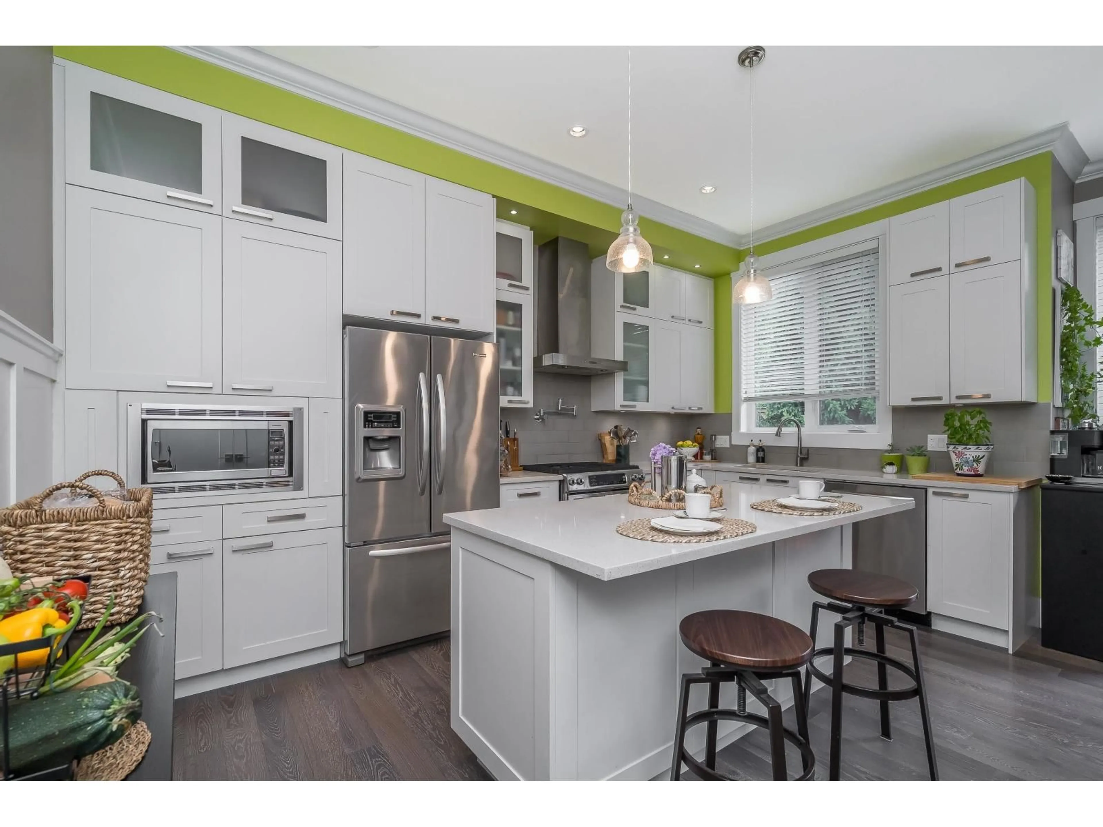 Open concept kitchen, wood/laminate floor for 4873 223B STREET, Langley British Columbia V2Y2X6