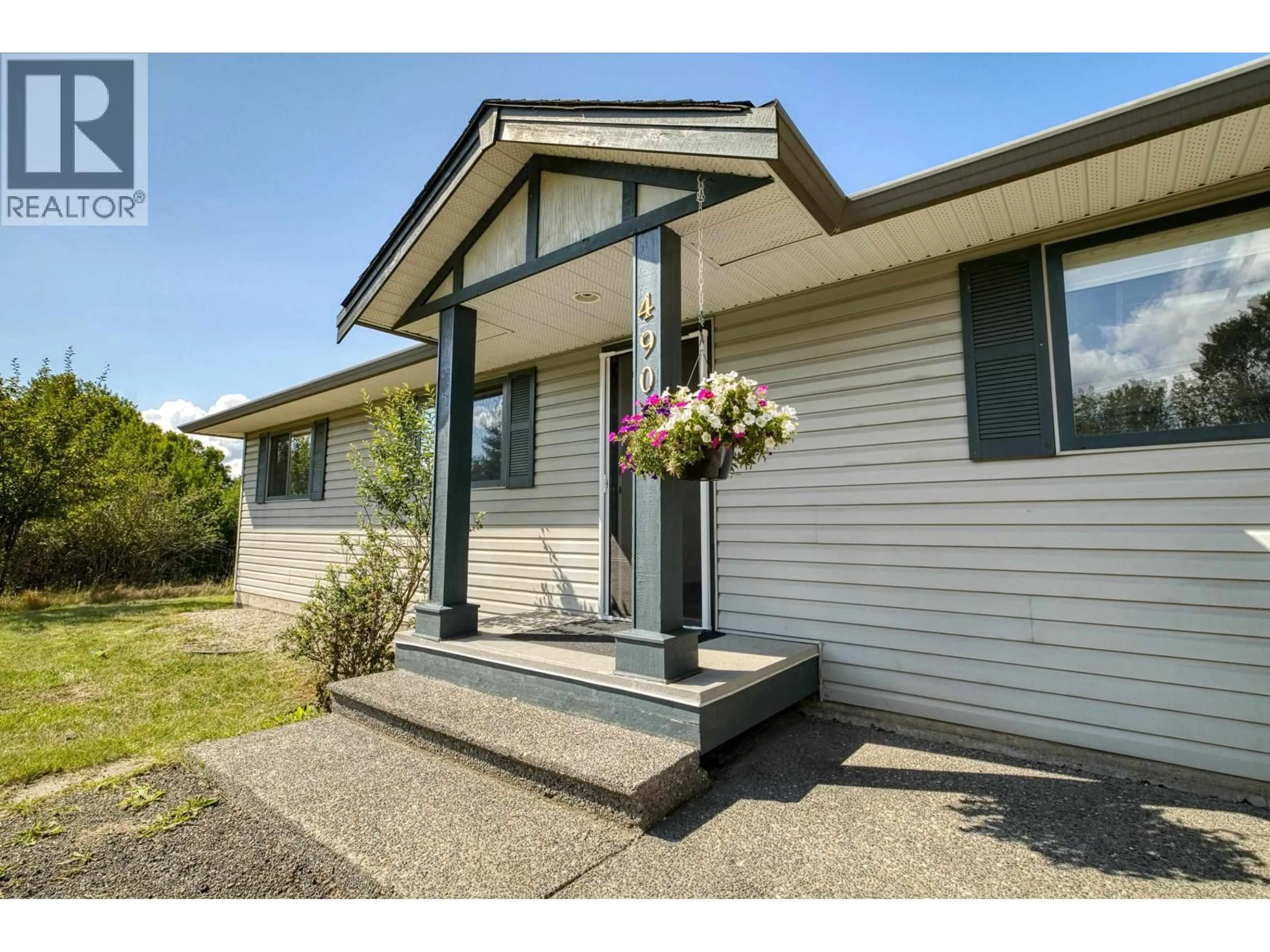 Home with vinyl exterior material, street for 4904 TELQUA DRIVE, 108 Mile Ranch British Columbia V0K2Z0