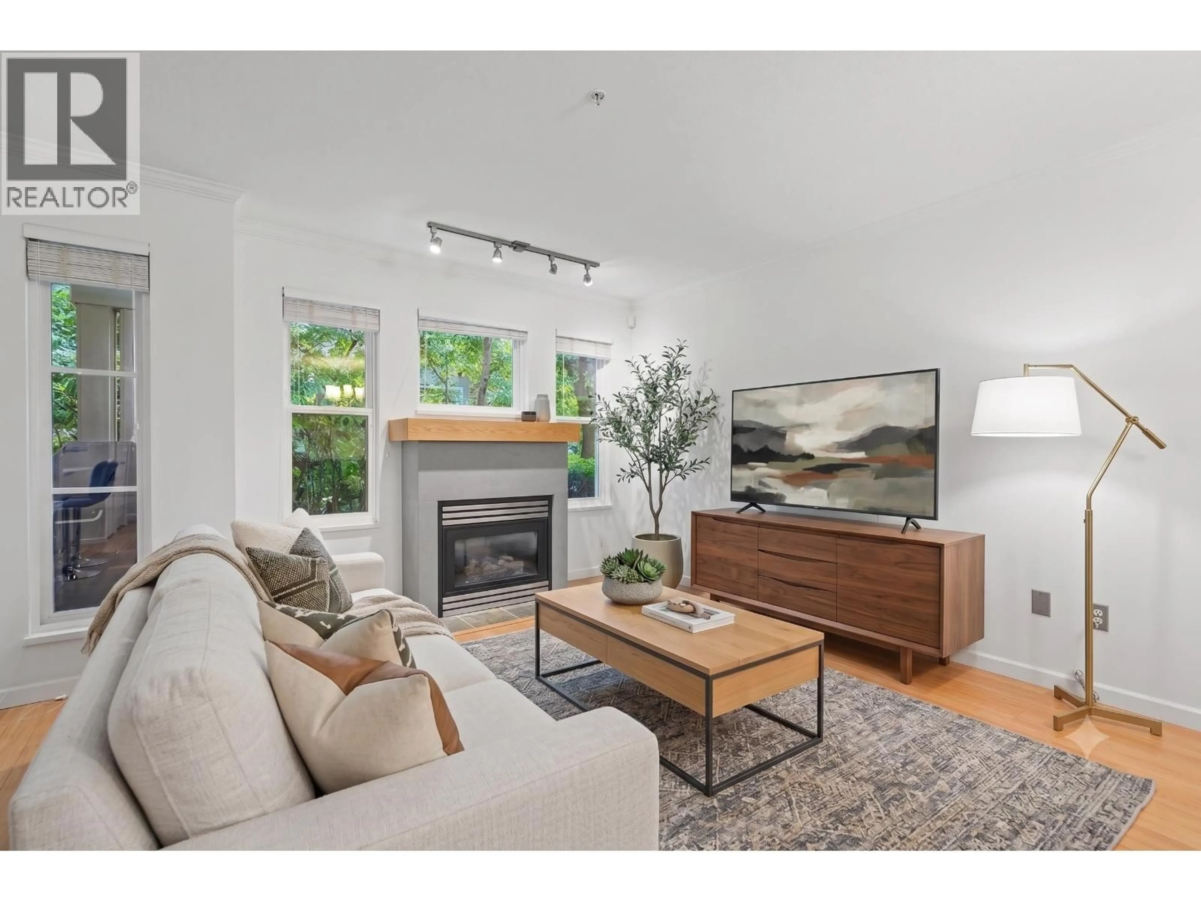 Living room with furniture, wood/laminate floor for 117 - 1702 56 STREET, Delta British Columbia V4L2P5