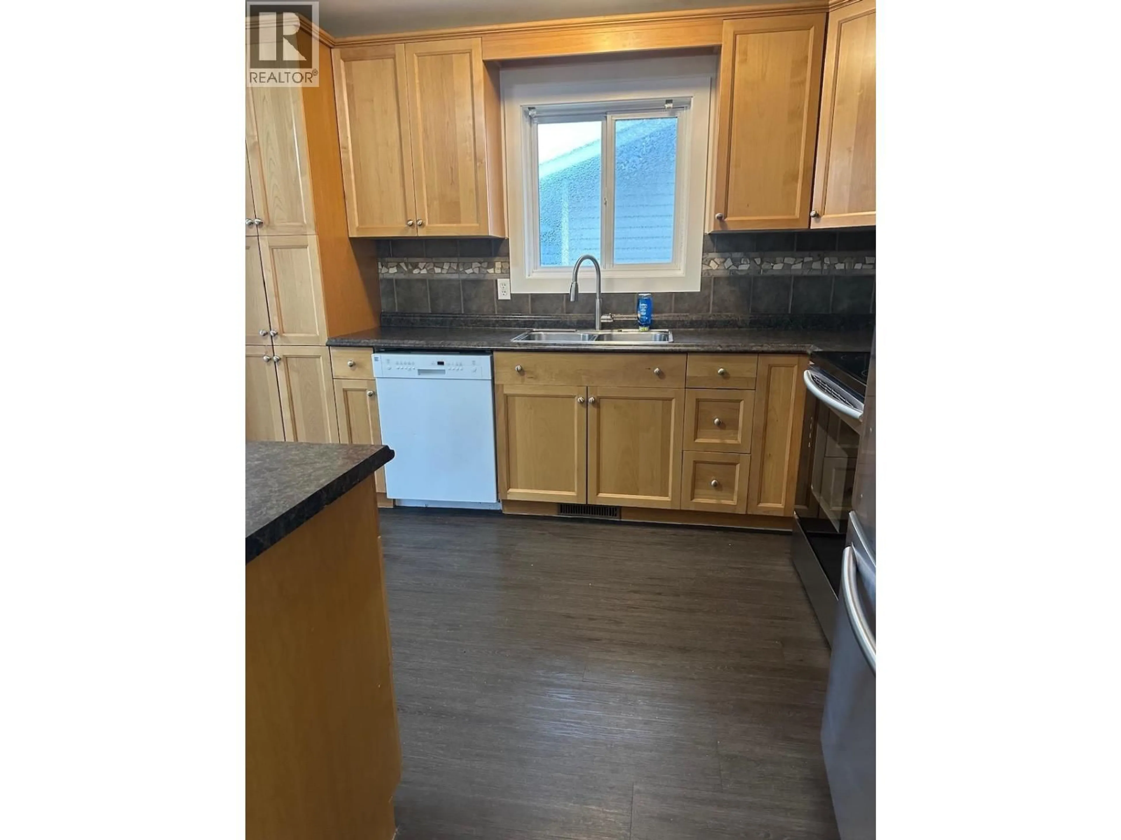 Standard kitchen, wood/laminate floor for 9015 91 AVENUE, Fort St. John British Columbia V1J4W3
