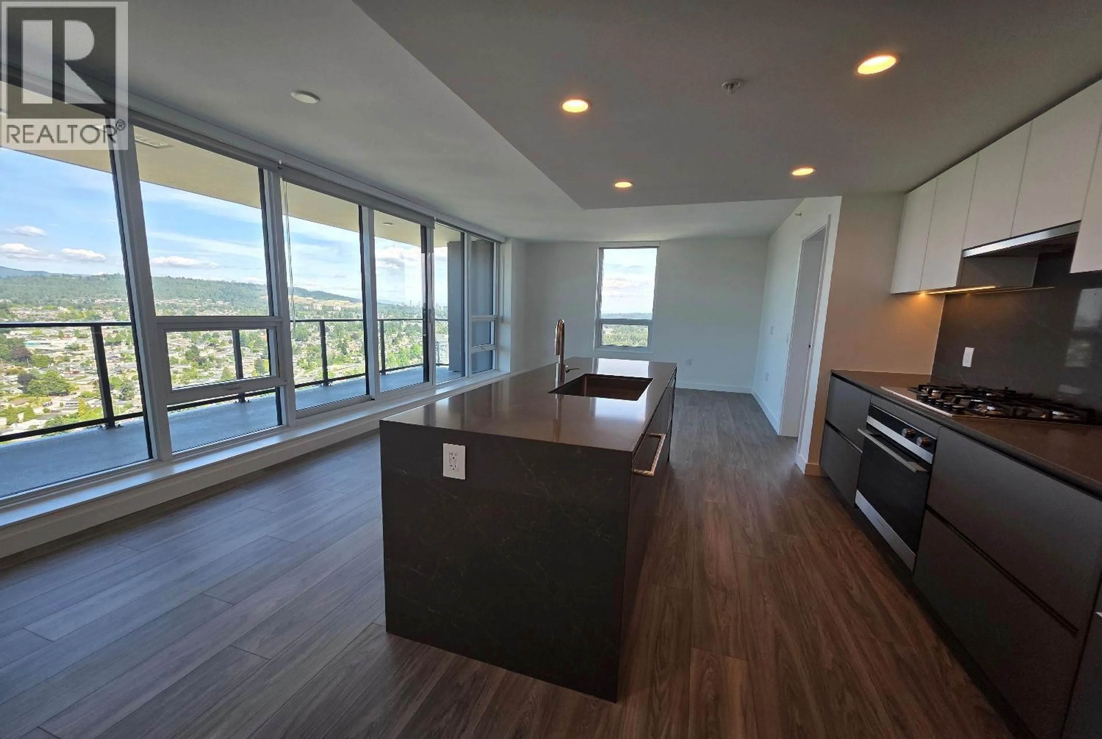 Open concept kitchen, wood/laminate floor for 3703 - 2135 SPRINGER AVENUE, Burnaby British Columbia V5B0C1