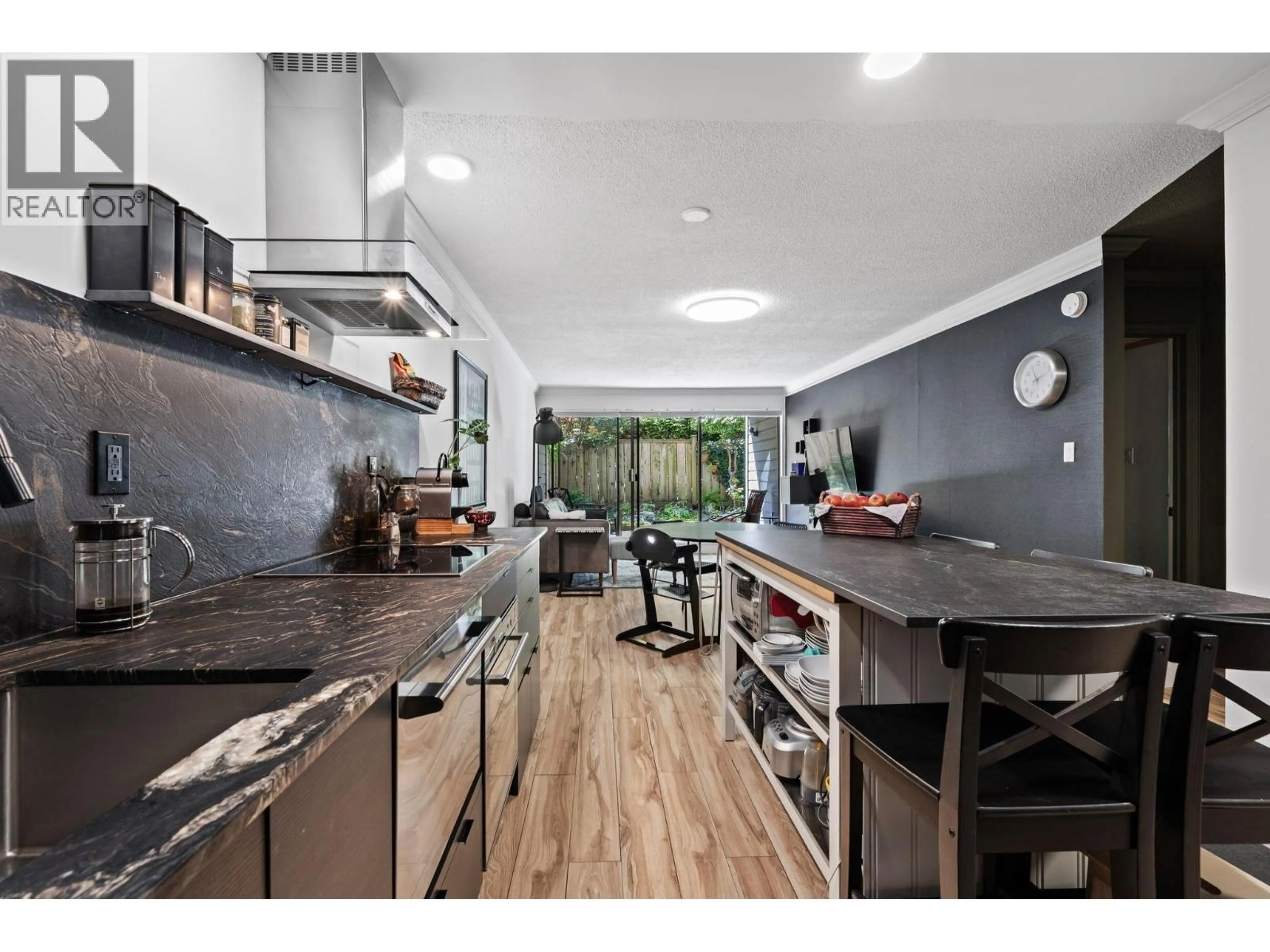 Open concept kitchen, ceramic/tile floor for 106 - 1710 13TH AVENUE, Vancouver British Columbia V6J2H1