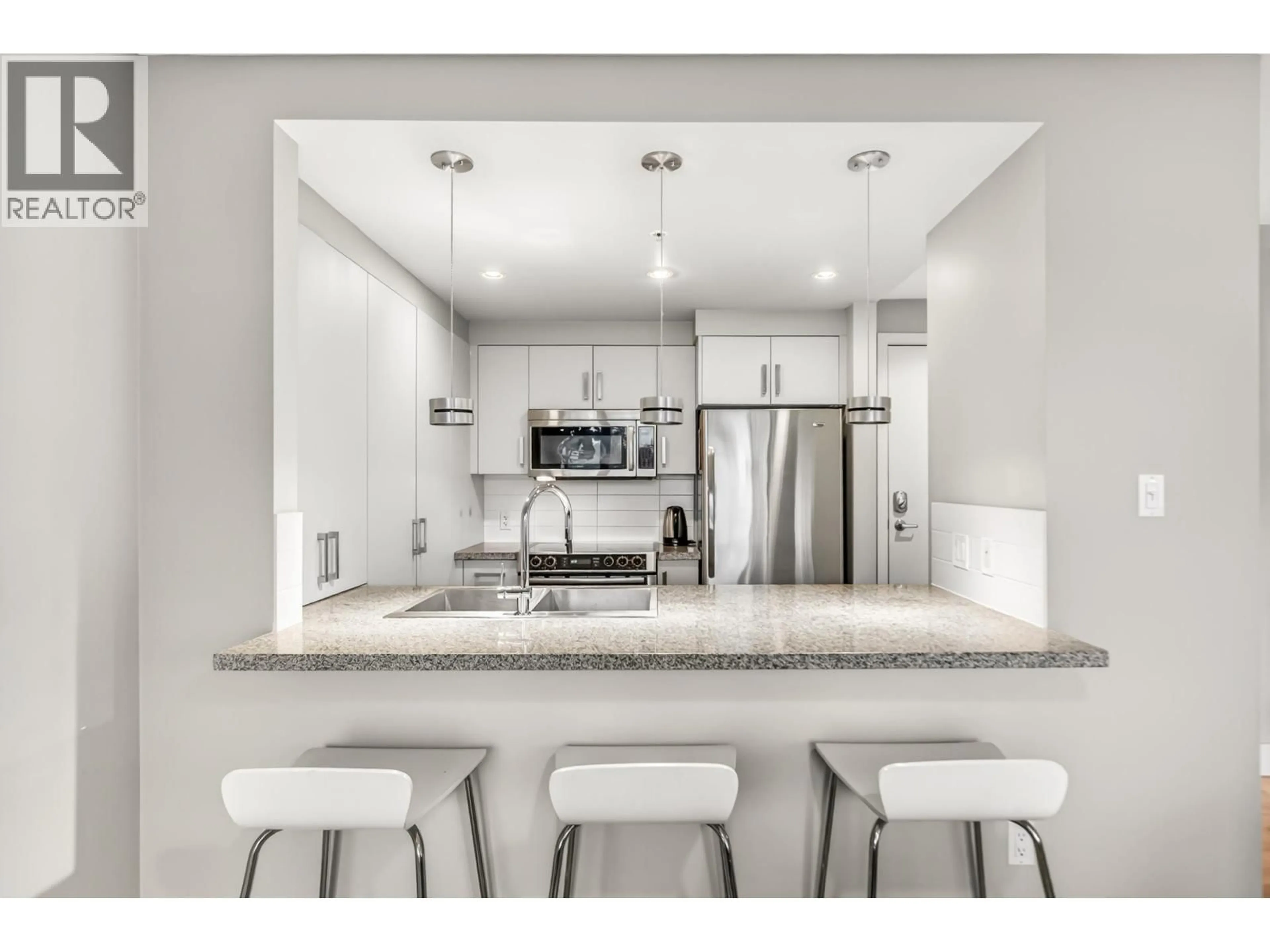 Open concept kitchen, unknown for 604 - 2959 GLEN DRIVE, Coquitlam British Columbia V3B0B8