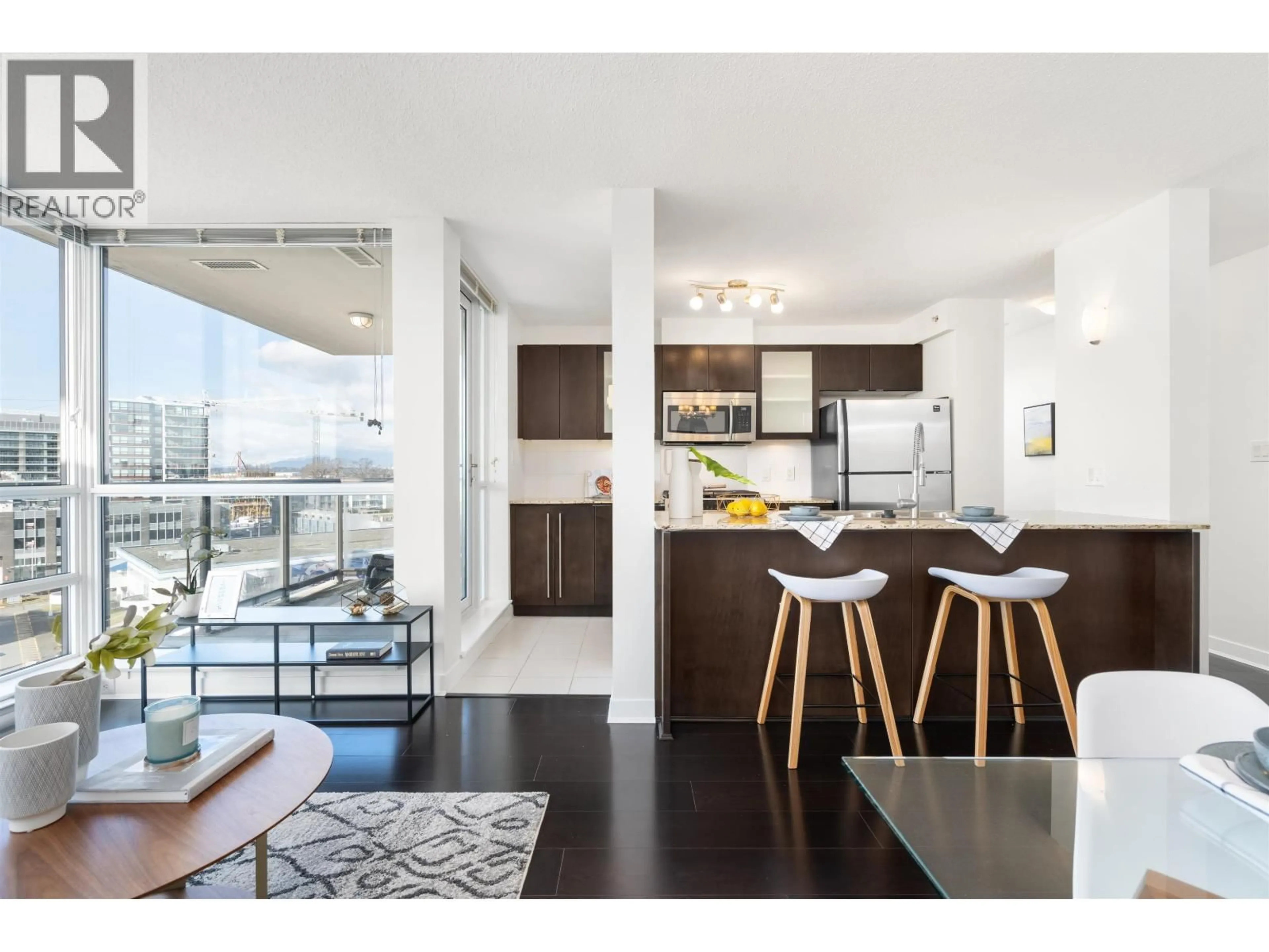 Open concept kitchen, wood/laminate floor for 1001 - 7555 ALDERBRIDGE WAY, Richmond British Columbia V6X4L3