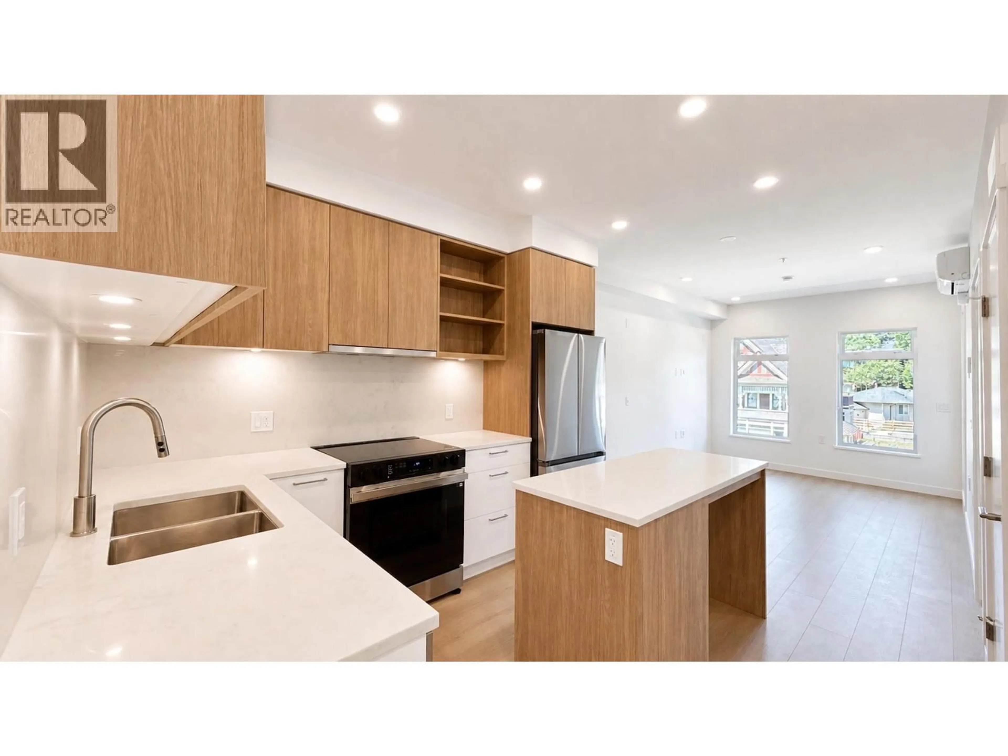 Open concept kitchen, wood/laminate floor for 408 - 82 FIRST STREET, New Westminster British Columbia V3L0L8