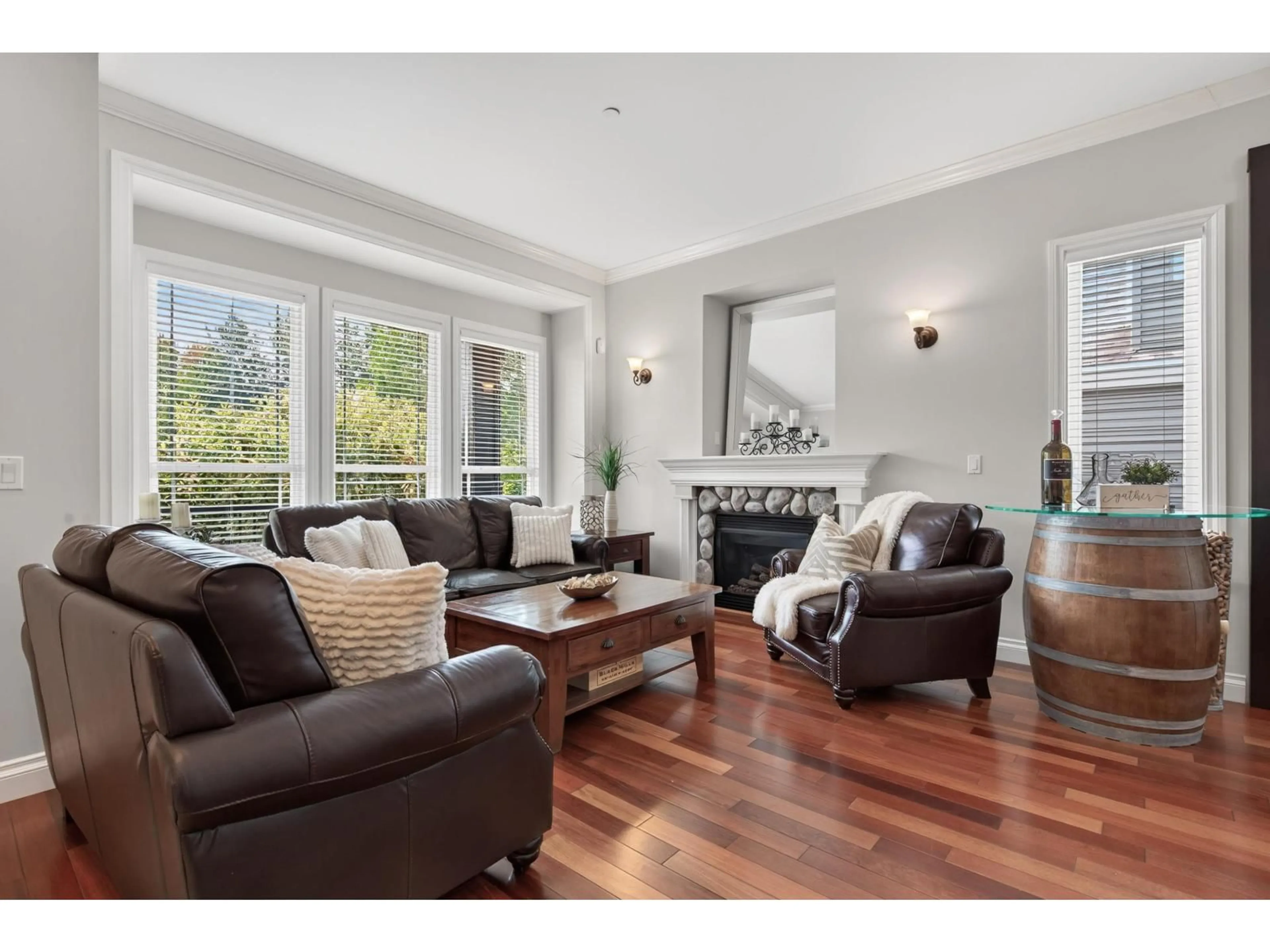 Living room with furniture, wood/laminate floor for 21857 51 AVENUE, Langley British Columbia V3A8P7