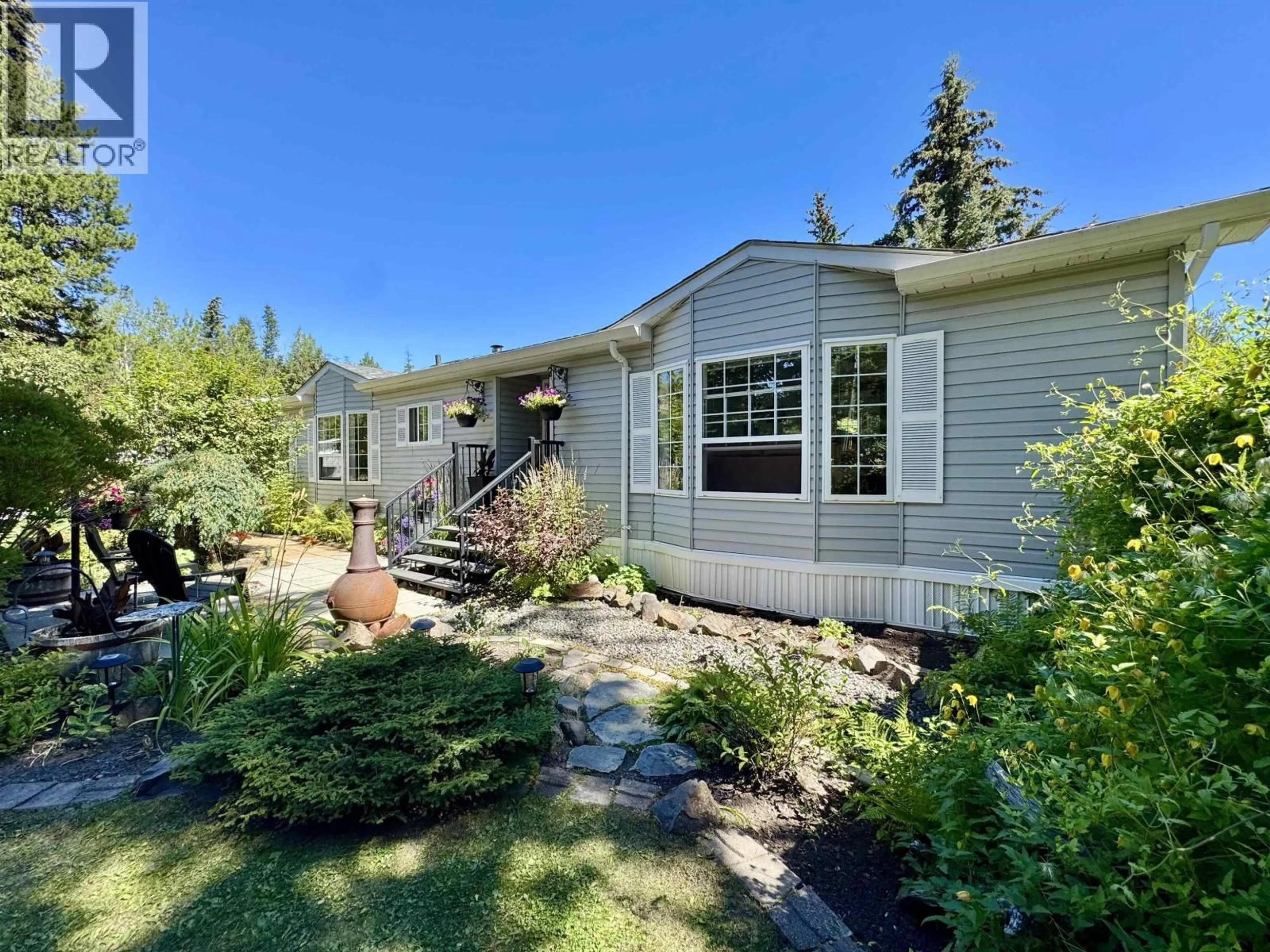 Home with vinyl exterior material, street for 6485 GREY CRESCENT, Horse Lake British Columbia V0K2E3