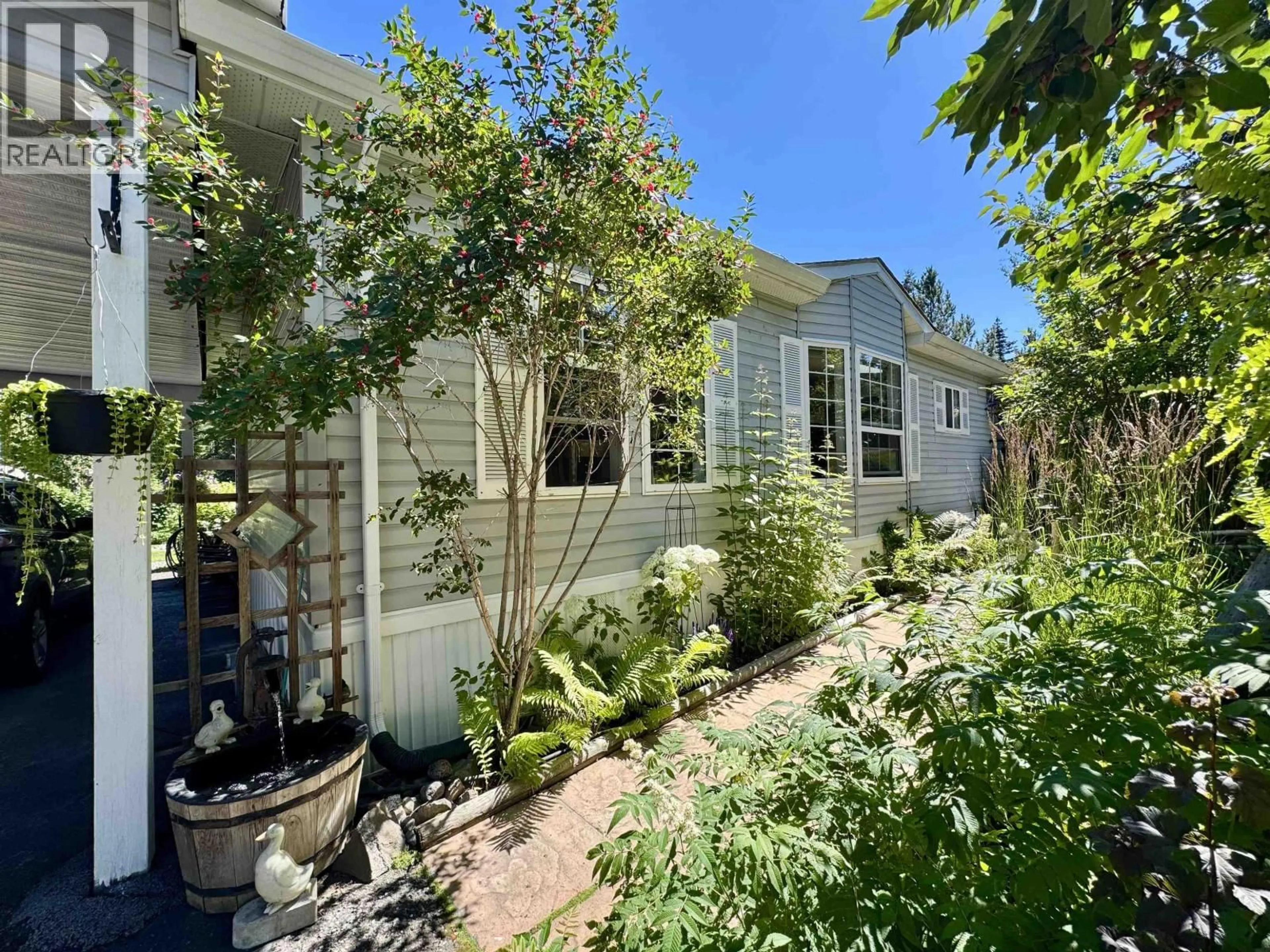 A pic from outside/outdoor area/front of a property/back of a property/a pic from drone, unknown for 6485 GREY CRESCENT, Horse Lake British Columbia V0K2E3