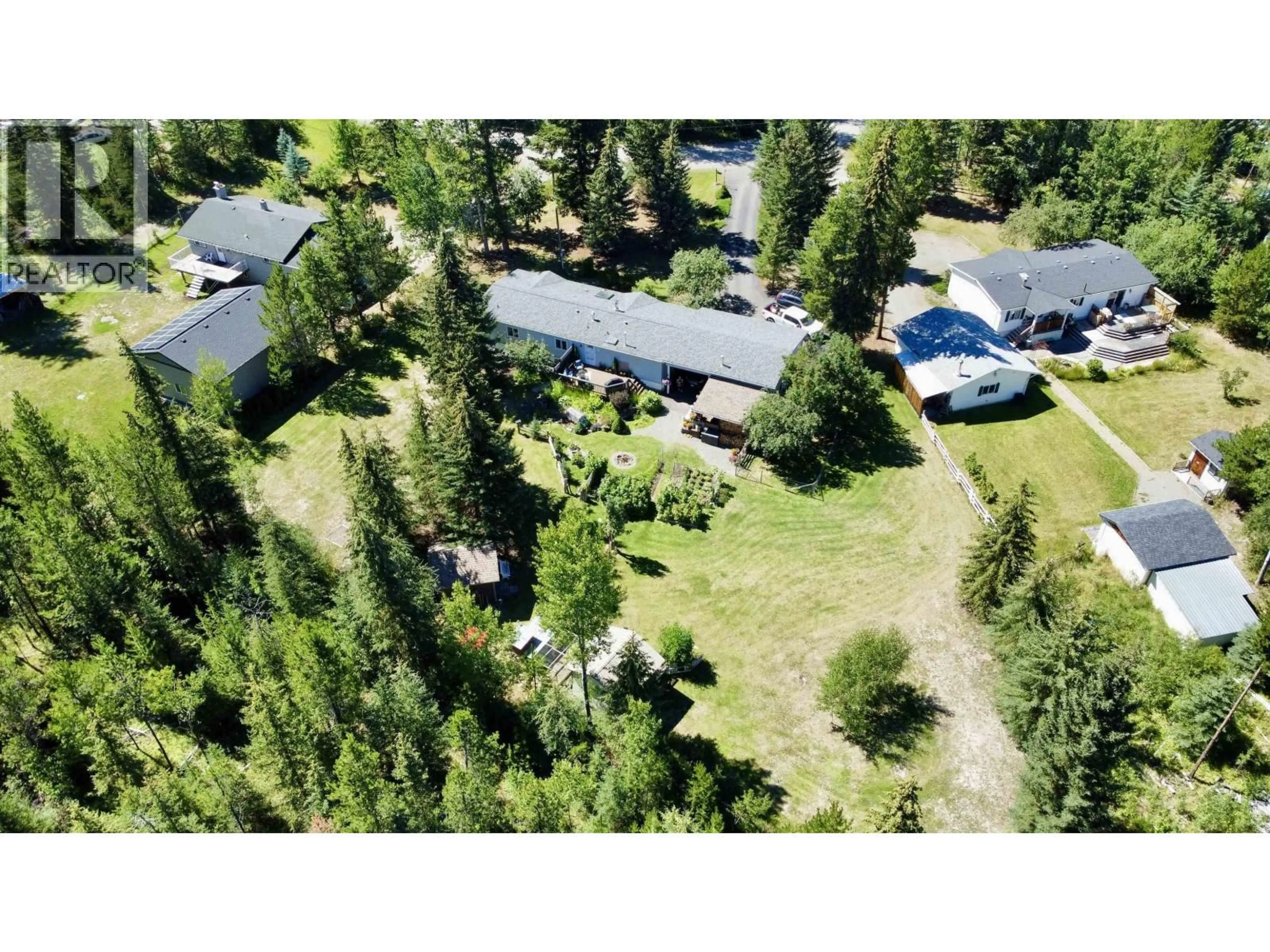 A pic from outside/outdoor area/front of a property/back of a property/a pic from drone, forest/trees view for 6485 GREY CRESCENT, Horse Lake British Columbia V0K2E3