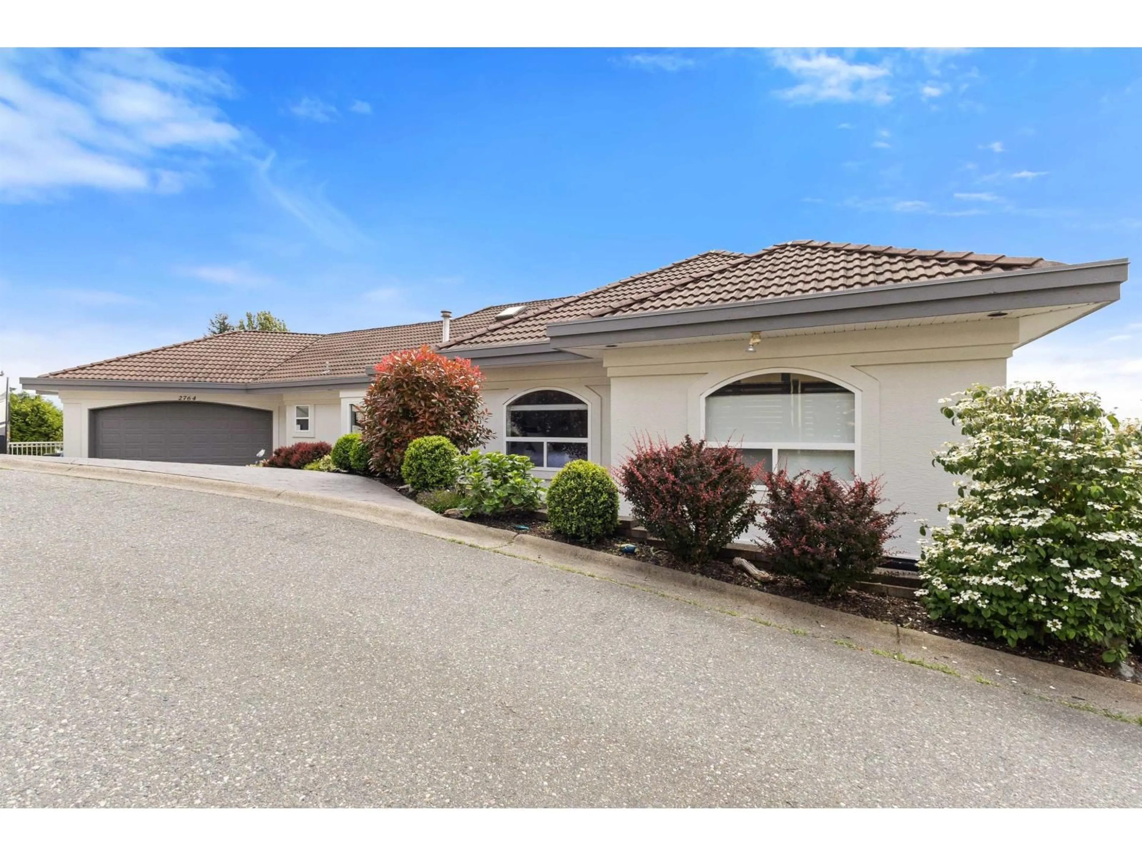 A pic from outside/outdoor area/front of a property/back of a property/a pic from drone, street for 2764 ST MORITZ WAY, Abbotsford British Columbia V3G1C3