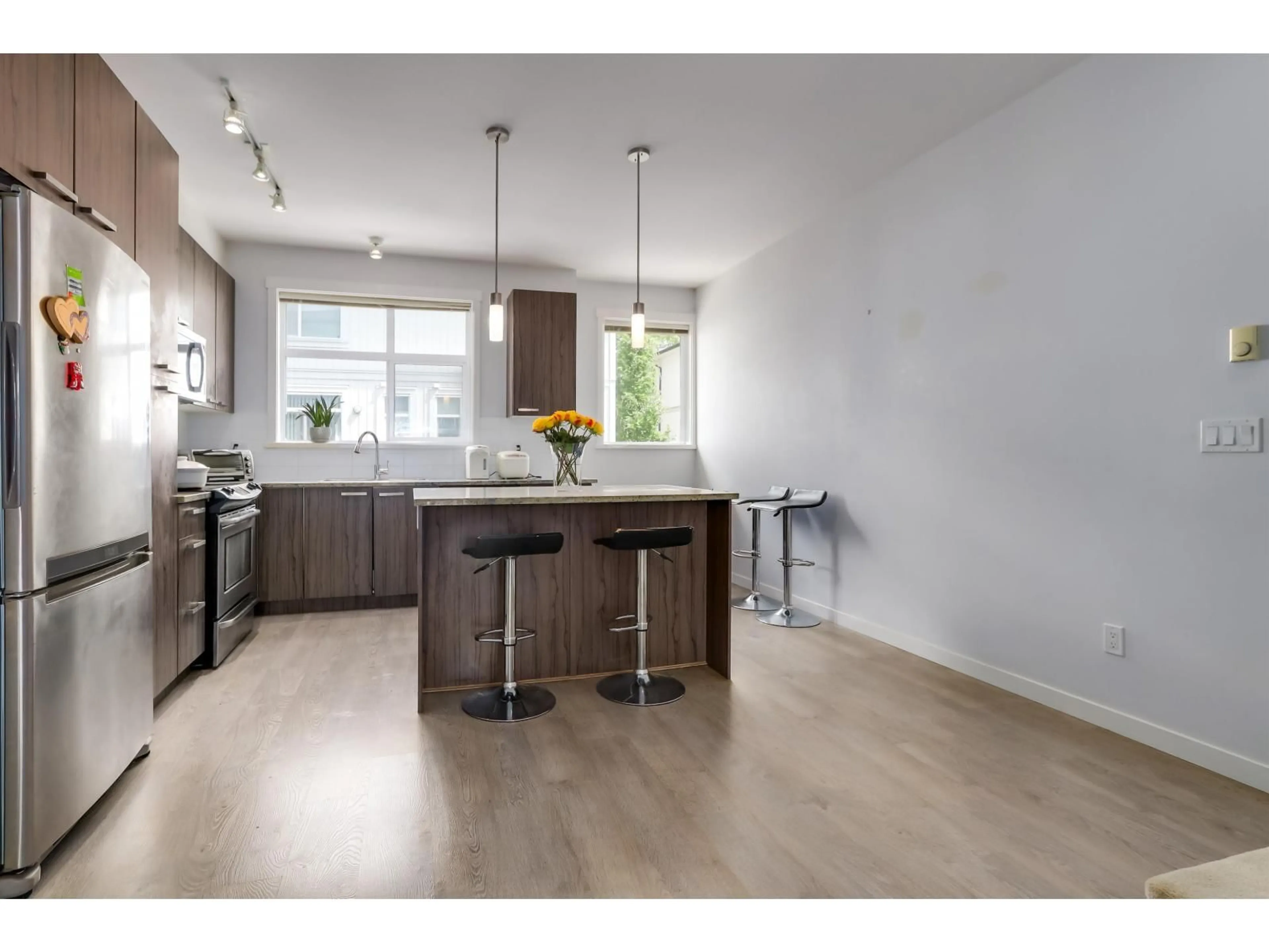 Open concept kitchen, wood/laminate floor for 59 - 8355 164 STREET, Surrey British Columbia V4N1E3