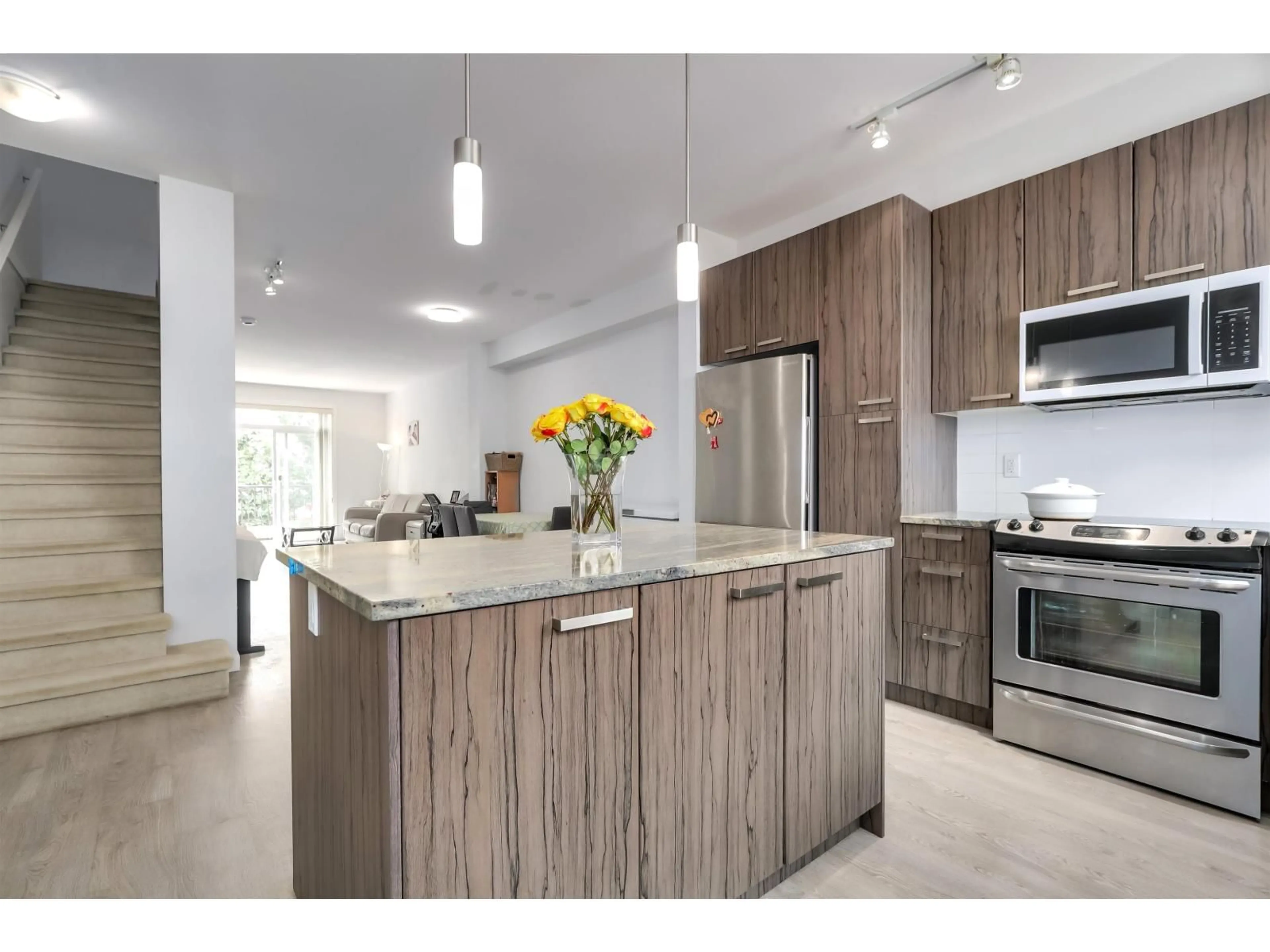 Open concept kitchen, wood/laminate floor for 59 - 8355 164 STREET, Surrey British Columbia V4N1E3