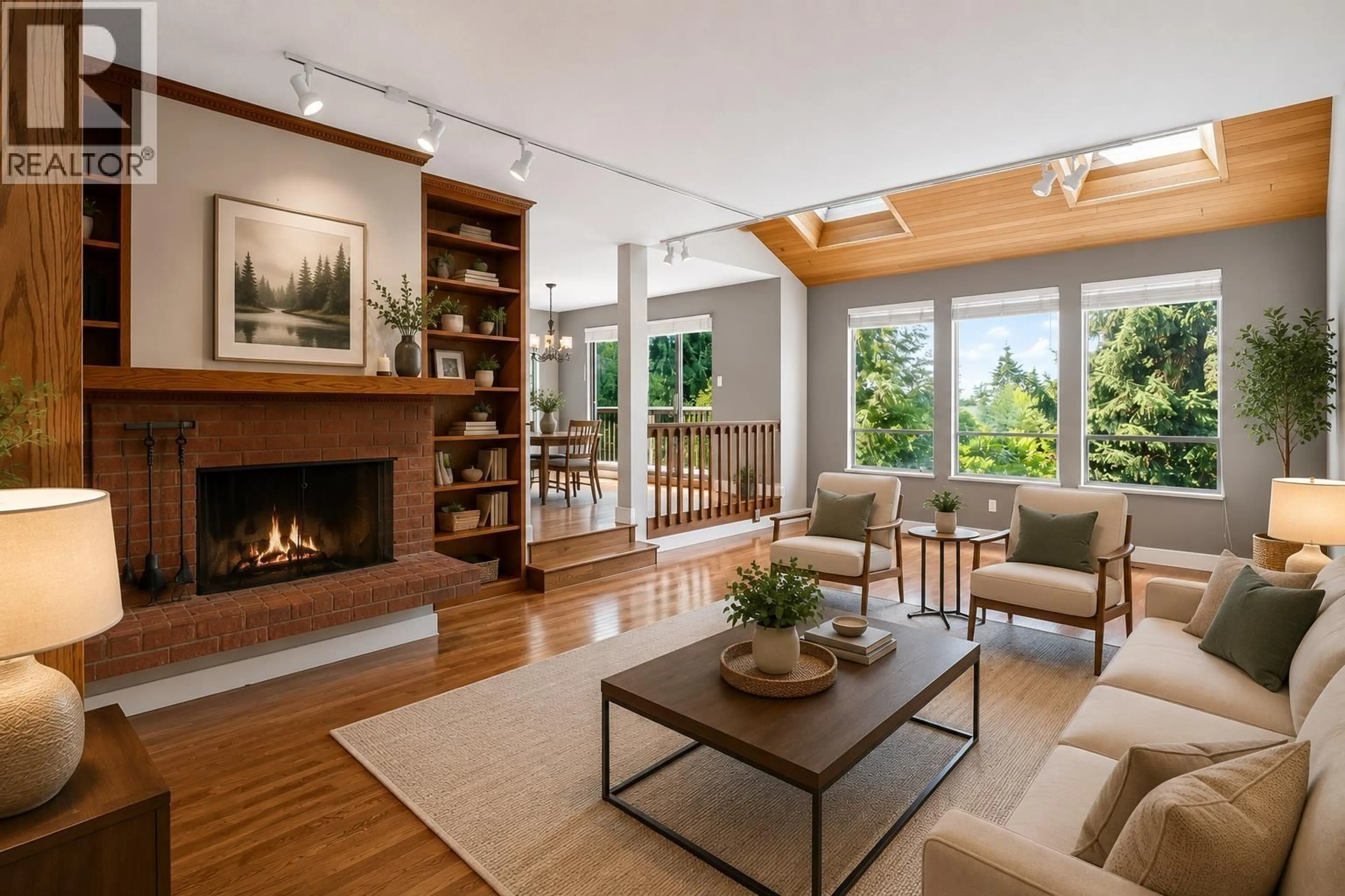 Living room with furniture, wood/laminate floor for 5600 GROUSEWOODS PLACE, North Vancouver British Columbia V7R4T4